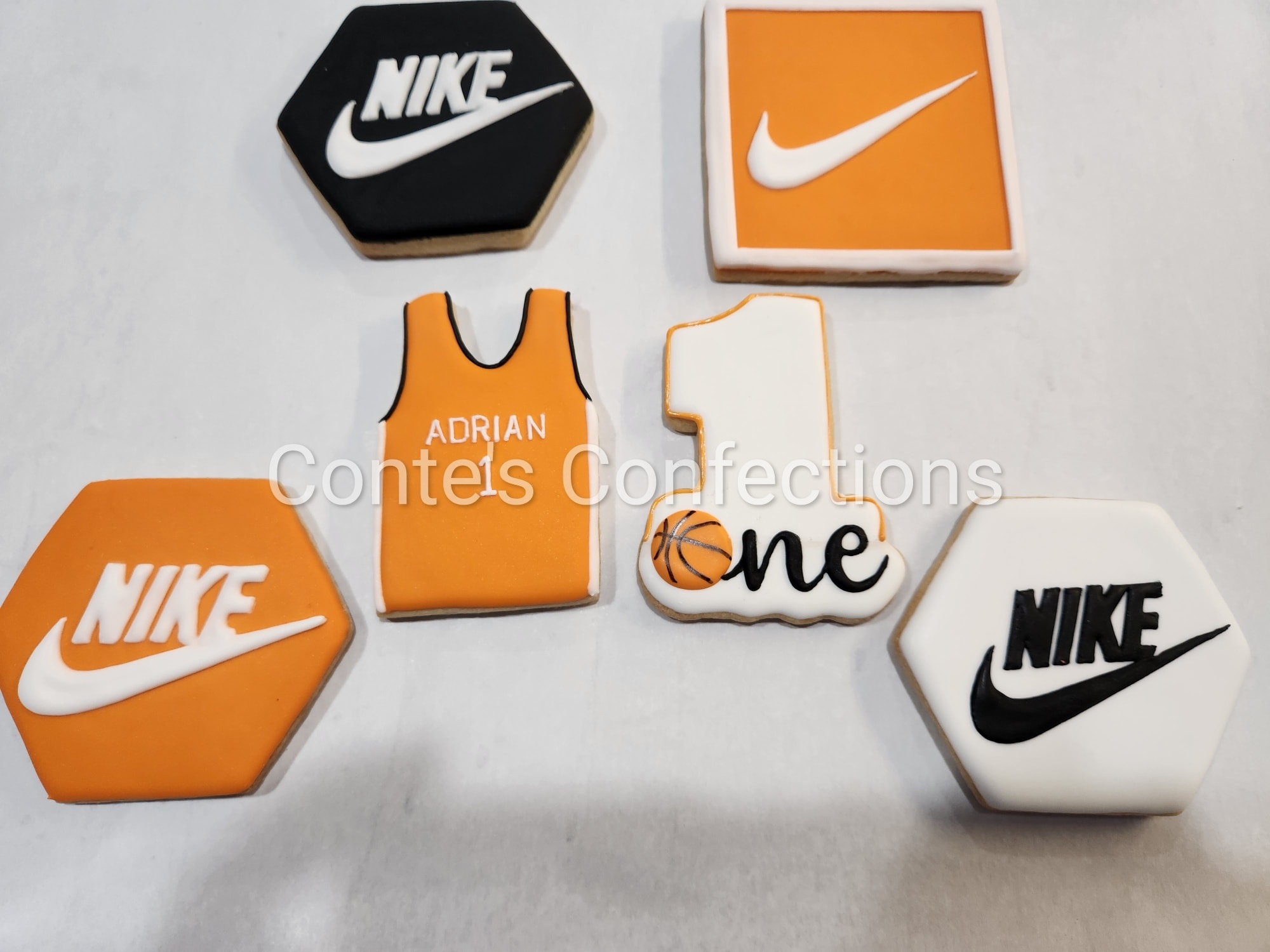 Sports first birthday sugar cookies.