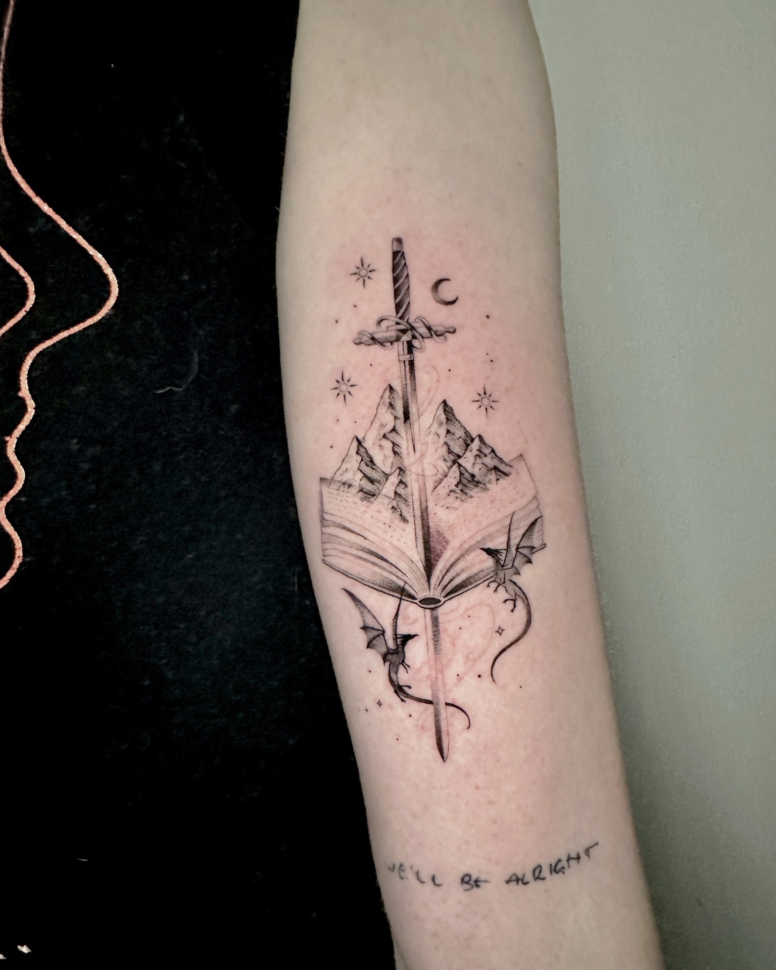 For the dreamers, the readers, and the adventurers 🗡️🐉✨ by @ninkeartsy
This fantasy-inspired piece brings together mountains, dragons, and a sword emerging from the pages , a reminder that every story is a world waiting to be explored.
Done at @thelostoasistattoo
✨ Want ink like this? 👉 DM @ninkeartsy or email tattooninkeartsy@gmail.com
to book your spot! ✉️
🎃 Don’t miss our Halloween Flash Day on October 31st — swing by for spooky flash tattoos, cozy vibes, and treats for all who dare to visit 👻🍬