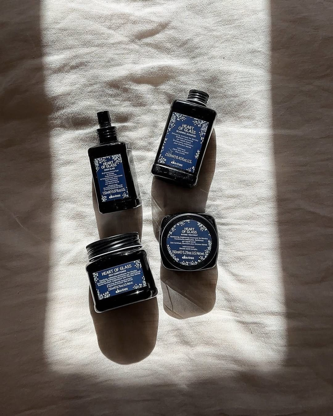 The summer months can cause brassiness, frizz, dryness, and breakage...HEART OF GLASS is here to protect you💙
Strengthen, repair and nourish your hair with 89-98% natural
and biodegradable ingredients that’ll help keep your blonde bright all season long✨