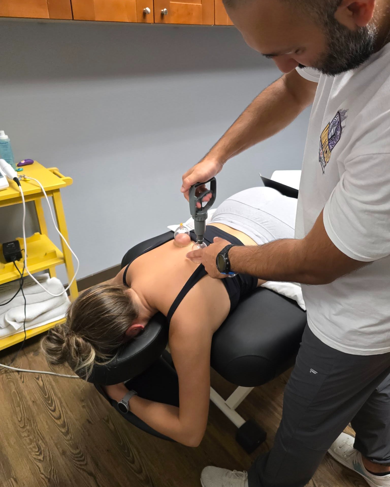 Just another day in the clinic — a bit of cupping, a bit of rehab, and a lot of “how’s that feel now?”