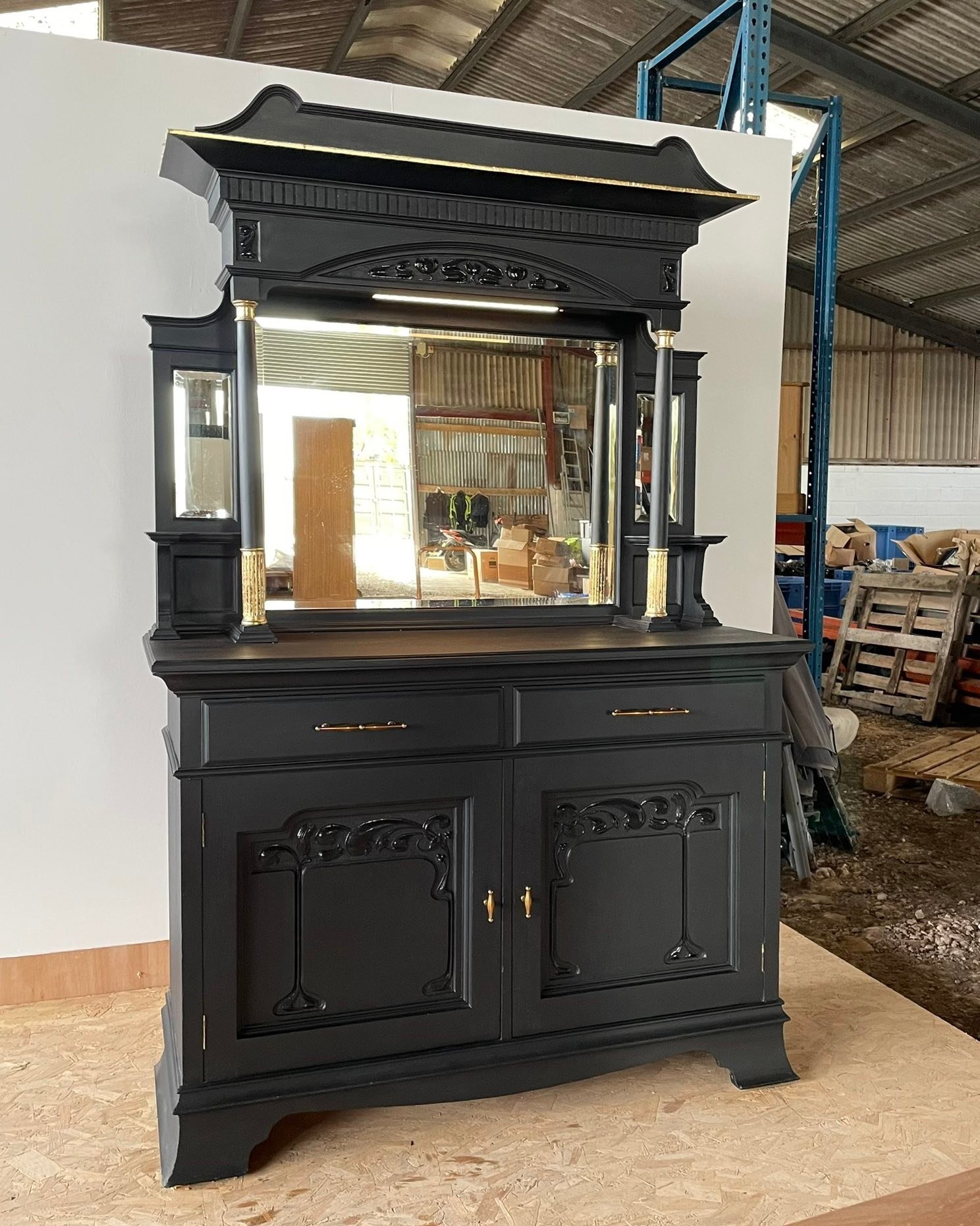Large Vintage Dresser – Ideal for an Oriental Restaurant or Luxury Reception Space
This dramatic vintage dresser has been restyled into a striking statement piece — a perfect fit for an oriental restaurant, cocktail bar, boutique hotel or high-end retail space.
Finished in durable matt black acrylic with glossy highlights and touches of imitation gold leaf, the carved detailing takes centre stage. The cupboard opens to reveal a deep cranberry red interior, creating a bold contrast that oozes warmth and luxury.
Functional as well as beautiful, it offers:
Lower cupboard with shelf
Two generous drawers
Upper shelving and display space
A vintage mirror with beautiful patina
Rechargeable warm strip light (always-on or motion-sensor mode)
Dimensions:
210 cm (H) × 137 cm (W) × 57 cm (D)
Countertop height: 98 cm
Ideal as a reception desk, statement bar back, feature display cabinet, or point-of-sale counter. A truly one-off piece with presence and personality.
Viewings and collection from SN5 0AG. Courier delivery available — please enquire for a quote.
#OrientalInteriors #AsianInspiredDecor #OrientalStyle #OrientalRestaurantDesign #AsianRestaurantDesign #BlackAndGold #StatementPiece #UpcycledFurniture #VintageDresser #RestaurantDecor #BarBackDesign #BoutiqueInteriors #CommercialInteriors #RelovedByJo #UniqueFurniture