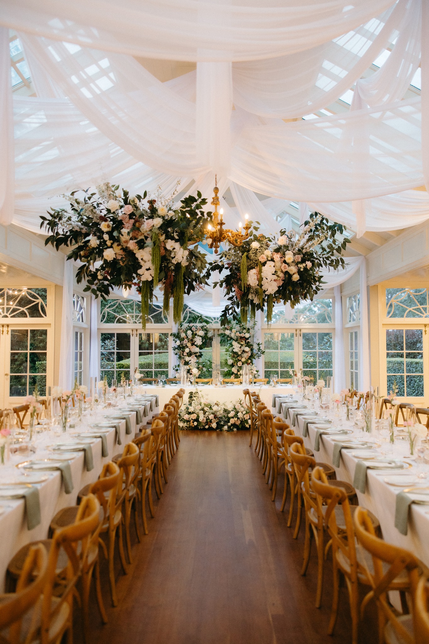 Ceiling blooms that seemed to float in the air, soft chiffon draping that moved like poetry, and a space transformed into something entirely its own.
Every floral cloud, every delicate fold, every detail placed with purpose, nothing by chance everything by design.
Its one thing to decorate a room but its another to create a feeling. Weightless, Romantic and Unforgettable
Perfection isn't luck, its experience, time and an eye for beauty refined over years of doing what we love.
For moments that deserve the best..
Florals, Styling, Hire + Draping by us
charger plates @brandition
captured @mitchbirchallstudios
cake @cakehouse.by.katrinaallan
@gabbinbar
#gabbinbar #gabbinbarflorist #weddingflorist #floraldesign #weddingflorals #ceilingdraping #weddinginspo #qldwedding #queenslandwedding #gabbinbar #gabbinbarhomestead #toowoombawedding #toowoombaflorist #toowoombaweddingflorist