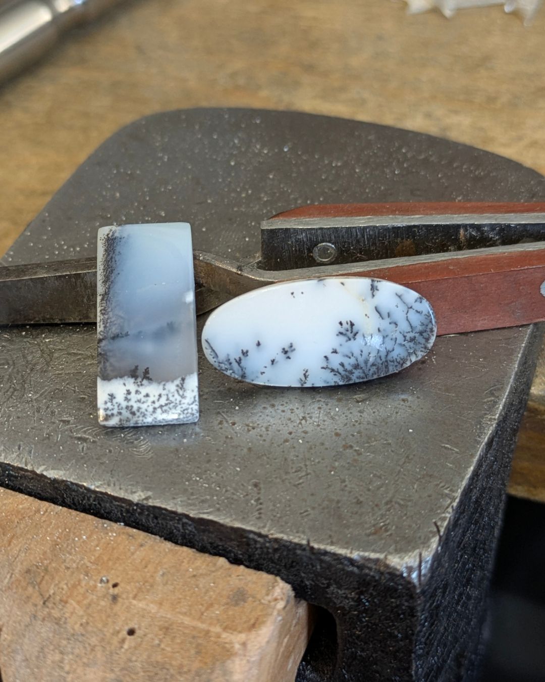 Aren't these beautiful? I'm working with some dendrite opals this week to create some winter feeling jewellery. I think the stone on the right looks like a little wintery flower meadow and the stone on the left makes me think of two little people walking over the snow with a heavy snow filled sky above them. I do feel as if I should have some Christmassy music playing as I work but it's definitely too soon for that.