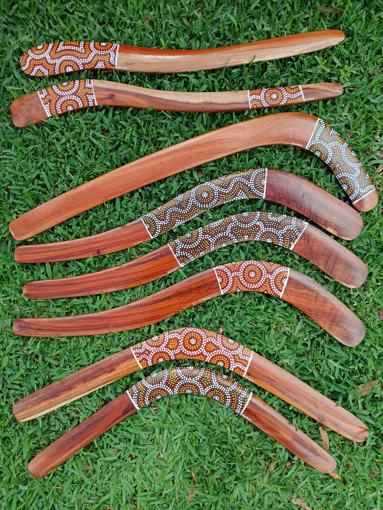 These are my Black Wattle Killer Boomerangs, Hook Boomerangs and Returning Boomerangs. There is also a Bloodwood Hook Boomerang (3rd from the top). Each piece has beautiful grain through out.
