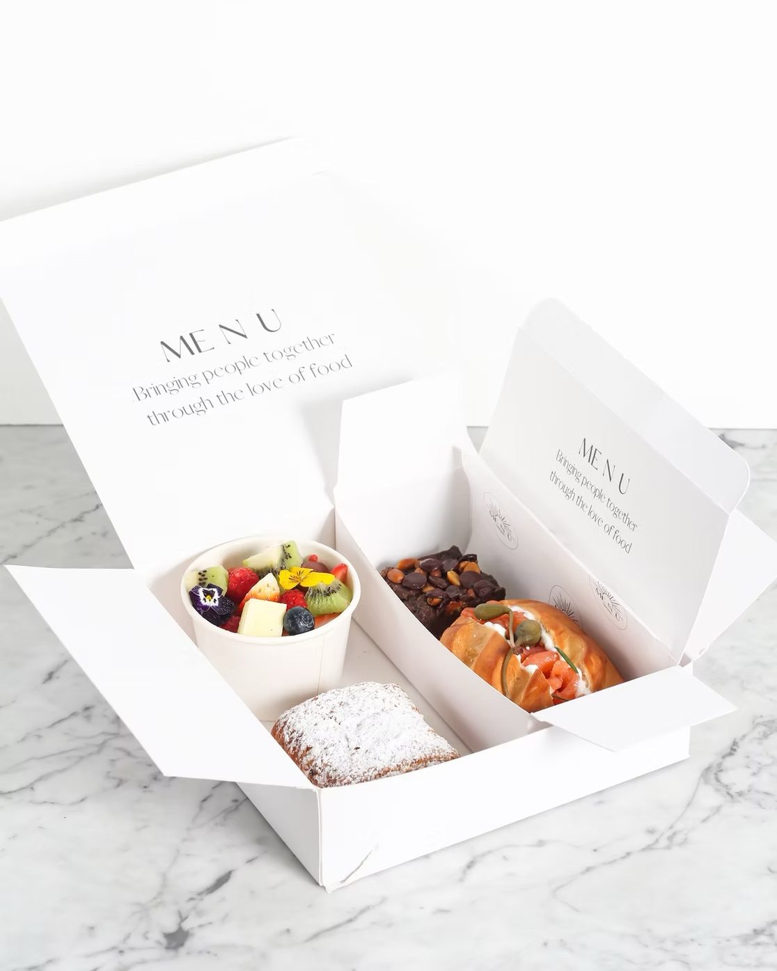 Some would argue that brunch is the most important meal of the day 😉
Our crowd-pleaser Brunch Box is filled with a fresh fruit bowl, mini croissant, chocolate peanut butter brownie and salmon cream cheese demi brioche bun 😍 (making sure your day is off to a great start)
Perfect for events, picnics or office treats! Order yours with the link in our bio.