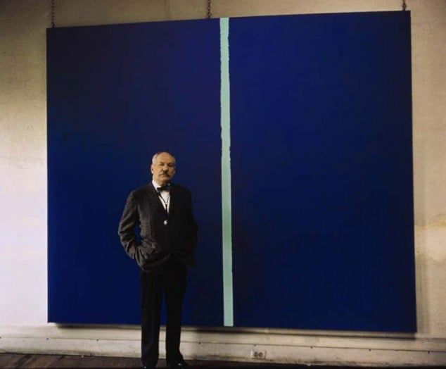In spring 2013, “Onement VI” fetched a record price of $43.8 million at auction at Sotheby's New York. The work was created by American artist Barnett Newman, a leading figure in the Abstract Expressionism and Color Field Painting movements. Estimated at between $30 million and $40 million, this price was a record for the artist in 2013, before almost doubling the following year.
The painting consists of two vibrant blue rectangles, divided vertically by a light blue line. This “zip”—a line of tension that structures the pictorial space of the canvas—is emblematic of the artist's practice. Created with adhesive tape, the random smudges produced by this technique give the “zips” their simultaneous sense of emptiness and substance.
Barnett Newman seeks to highlight the emotional power of color. According to him, abstraction allows emotions and feelings to be better conveyed by inventing new forms of expression capable of capturing the essence of existence. Reduced to their simplest expression—devoid of objects, dogmas, precedents, or referential subjects—the monochrome flat areas of his paintings give the viewer the impression of drowning in color. The “zips” offer them a means of escape: "I hope that my painting has the impact of giving someone, as it did me, the feeling of his own totality, of his own separateness, of his own individuality."
Created in 1953, this work is the largest of the series of six works, and is one of the only two that have been owned by private collectors. The others are part of the collections of the Museum of Modern Art in New York, the Wadsworth Atheneum in Hartford, and the Allen Memorial Museum in Oberlin. “Onement VI” was loaned by the Newman couple to the Solomon R. Guggenheim Museum in 1961, at a time when Abstract Expressionism was in decline and the Minimalist, Conceptual, and Processual movements were gaining importance alongside Pop Art.
#barnettnewman #onement #abstractexpressionism #contemporaryart