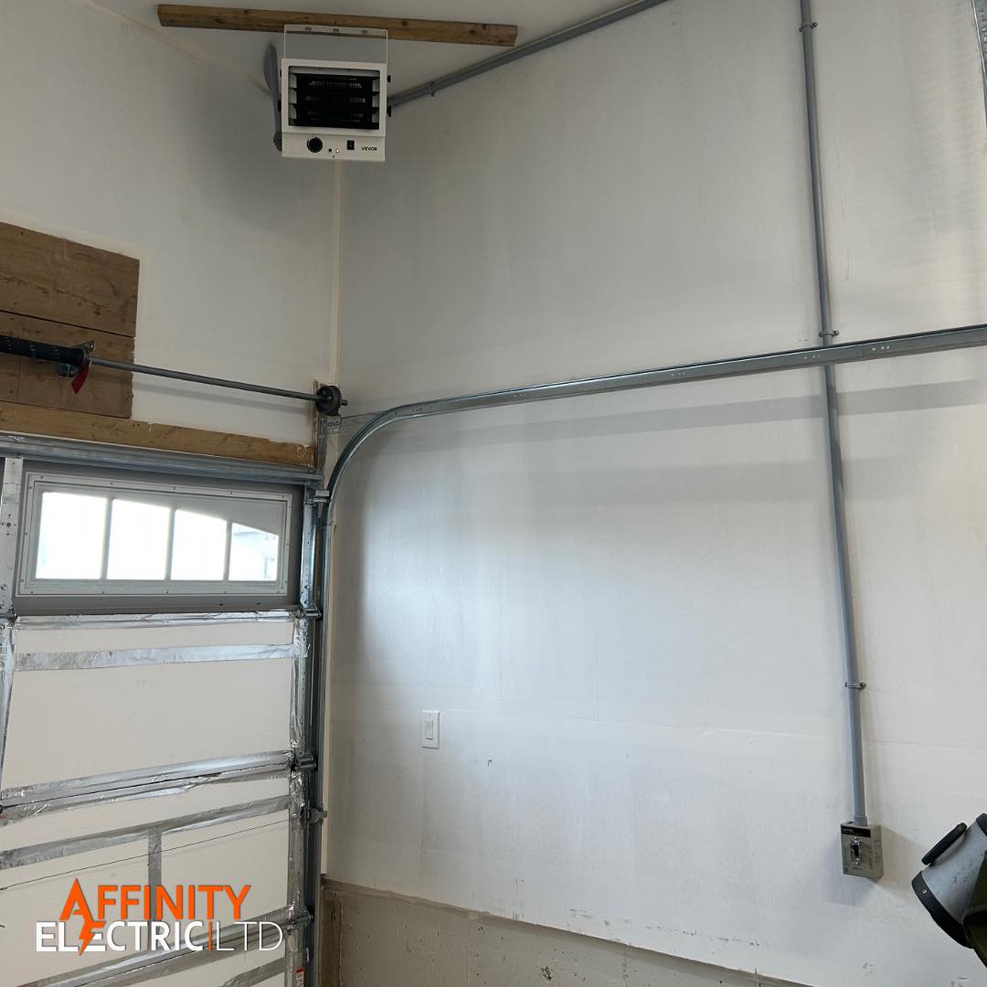 🔥 Stay Warm in the Garage This Winter!
Another clean garage heater install wired and mounted by the Affinity Electric team.
✔️ Safe & secure ceiling mount
✔️ Hardwired in conduit for durability
✔️ Perfect for workshops, garages & hobby spaces
Don’t freeze in your garage this winter get your heater wired up the right way.
📞 Book now before the cold really hits!
#GarageHeater #WinterReady #AffinityElectric #BarrieElectrician #SimcoeCountyTrades #WorkshopHeat #CleanInstall #ConduitWork #ElectricalContractor #StayWarmCanada
