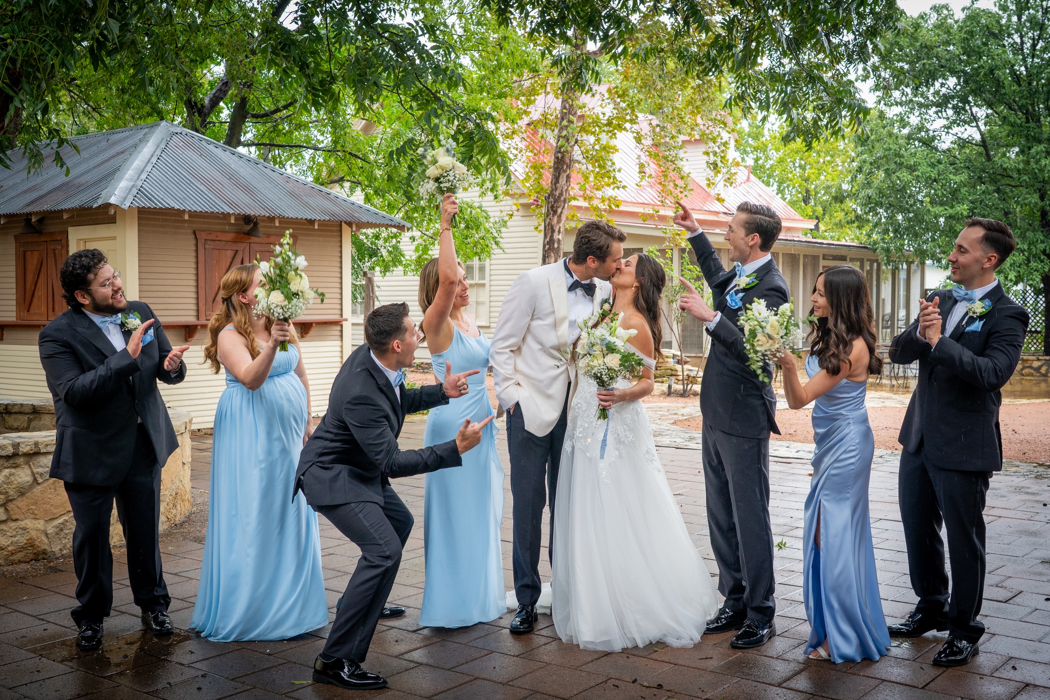 A little rain wasn't gonna stop this wedding party. #austinweddingphotographer #austinweddingvideographer #austinweddingphotography #austinportraitphotography #weddingphotographer #austinweddingparty #weddingpartyportraits