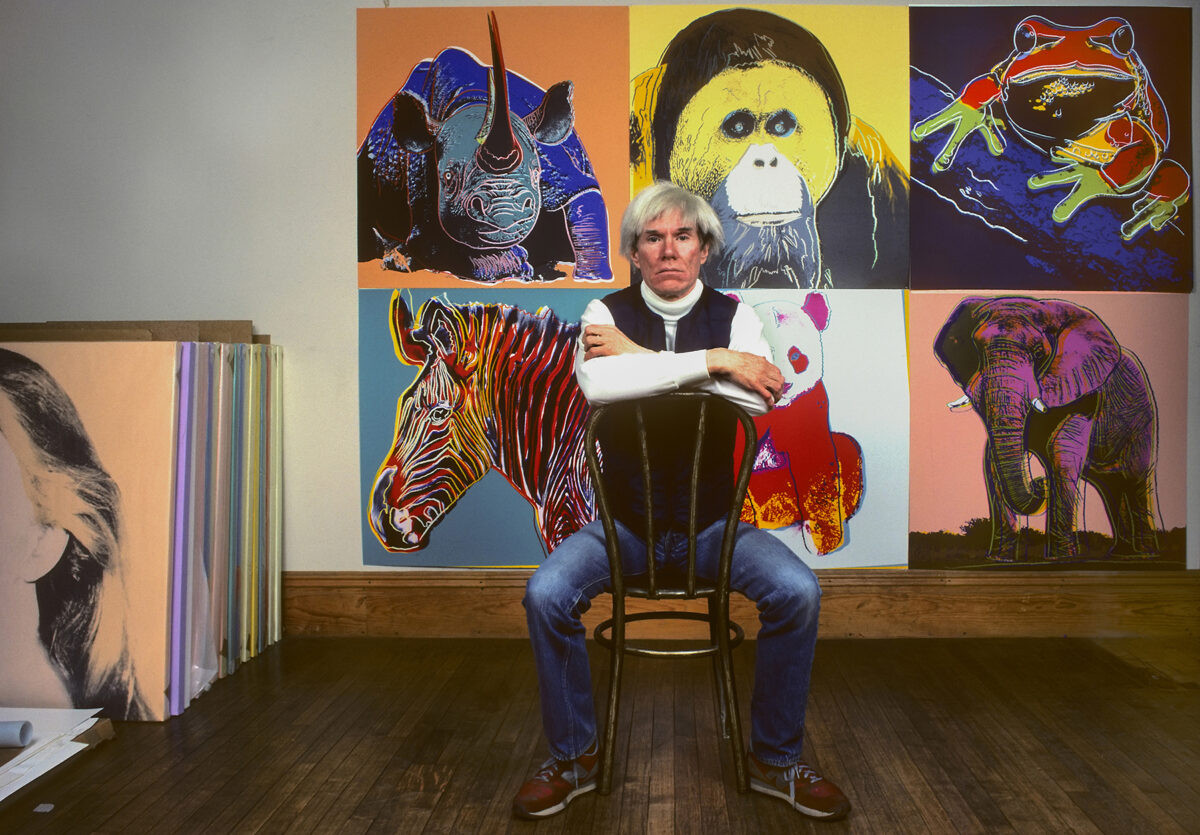 On the occasion of the COP30 that is currently taking place in Brazil, it seems befitting to take a look at two major series by Andy Warhol: Endangered Species (1983) and Vanishing Animals (1986). These works reveal a little-known side of the artist: his deep interest in the environment and the protection of endangered species.
At the request of art dealers Ronald and Frayda Feldman, Warhol created a series of ten works (canvas and prints, limited to 150 copies) in 1983, depicting animals on the endangered species list, such as the Siberian tiger, the giant panda, the black rhinoceros, the koala, the gorilla, and the African elephant. This series celebrates the tenth anniversary of the US Endangered Species Act. True to his pop style, Warhol plays with bright colors, electric contrasts, and fluorescent backgrounds, transforming these animals into nothing short of cultural icons—which can be interpreted as a metaphor for the possible fate of these animals, just like Marilyn Monroe or Elvis Presley… Warhol nicknamed these works ‘Animals in Makeup’—emphasizing the artificiality of consumer society, which engulfs even nature. This artificial beauty masks the fragility and imminent disappearance of these species.
Three years later, Warhol revisited the issue of these disappearances in a more serious tone. In collaboration with Dr. Kurt Benirschke, a conservation biologist, he created the Vanishing Animals series. Based on scientific photographs, this series brings together 16 rare or already extinct species: the California condor, the Sömmerring's gazelle, the La Plata river dolphin, the Sumatran rhinoceros, the Puerto Rican parrot... Here, the colors are darker, more melancholic, and the approach less pop. Created just one year before Warhol's death, these works express his acute awareness of death and time—recurring themes at the end of his life.
Playing on the tension between artificiality and the reality of extinction that lies beneath the surface, both series testify to Warhol’s pioneering treatment of ecology in contemporary art.
#cop30 #contemporyart #environment @andywarholgallery #andywarhol #popart