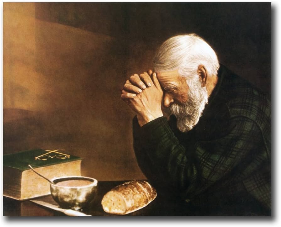 We have the picture in this post hanging on the wall of our home. To be more accurate, we have TWO of this same picture hanging up in our home. I guess my wife really likes it. It’s a photograph taken around 1920, and it’s entitled “Grace.” An elderly man prays, or says “Grace,” over a very simple meal, that honestly doesn’t look very tasty. But that not-so-appetizing meal is what makes this picture captivating. Even this simple food merits thanksgiving because it’s a sign of God’s undeserved love, or grace.
I’m a few months into an attempt to meet with all of our church’s young adults one on one. Yesterday I spent a fun afternoon in a coffee shop with a young man who has been at our church a long time. We talked about the things that make us grateful and how that gratitude can positively impact our life perspective and our relationships. I listened joyfully as he talked about the circumstances of his life, both good and bad, and connected them to God’s grace in His life.
Gratitude is an interesting concept, isn’t it? The amount of gratitude we have is very dependent on our understanding of what we deserve. The more I feel entitled to something, the less I’m going to stop and pray for it like the elderly man and his simple bread. Today is a good opportunity to reflect on what I deserve (nothing) vs. what I get (more than I can even understand). As we go through a series of readings and devotions in worship, let us realize all over again that God’s gifts in our nation, our food (even the vegetables on your plate today, kids), our beautiful world, our family, and our church family are all undeserved blessings. Sinners though we may be, God continues to provide more than we could ever ask or imagine, most importantly, through the cross of Christ. Today let us say grace for God’s grace, which shows up on our tables, in our sanctuary, and beyond. Join us for worship this morning at 10!