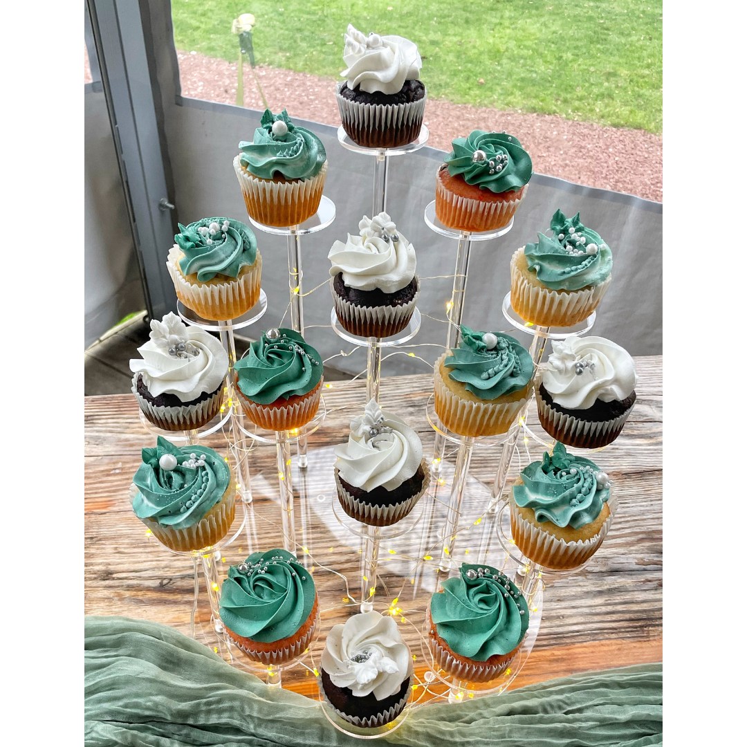 Last wedding of the year — though hopefully not the last one I’ll be posting — and it was such a beauty. The mix of crisp whites and deep greens was the perfect dramatic combo to carry us from cozy fall vibes into that early-winter chill. And the couple? Truly the kindest. So easy to work with, and they loved their cake (which always makes my day).
They picked a seasonal trio that blended fall warmth and winter chill in the best way. Cherry chocolate chip (forever a favorite), the buttery, cozy sweetness of butterscotch caramel, and the cool, refreshing chocolate peppermint. A little something for everyone, no matter which side of the seasonal fence you’re on.
They weren’t fans of gold, so silver took the spotlight — and it shimmered beautifully. Lots of whites, greys, and silvers played against that dramatic forest green, giving it a wintery feel without being cold.
And the display… chef’s kiss. The height variations, the soft wood tones, the venue in the background — everything came together like the perfect cozy-meets-frosty moment. Such a stunning seasonal sendoff to this year’s celebrations.
Size/Flavor: 12"/8"/6"Chocolate Peppermint
Filling: White Chocolate Ganache
Buttercream: Vanilla
Size/Flavor: 1.5 Dozen Chocolate Peppermint
Buttercream: Vanilla
Size/Flavor: 1.5 Dozen Butterscotch
Buttercream: Caramel
Size/Flavor: 1.5 Dozen Chocolate Chocolate Chip
Buttercream: Vanilla
🌐 www.treatsbyallyson.com
FB: Treats by Allyson
IG: @treatsbyallyson
New here? Welcome! 👋🏻 All my treats are dairy, egg, peanut, and tree nut-free, with fully customizable options: i.e. gluten, sugar & other ingredients to meet your needs—all without compromising on flavor (seriously, though, they’re even better!). Don’t believe me? Try them—you’ll never look back!
#CustomTreats #CakeDecorating #carrollcounty #carrollcountymd #carrollcountymaryland #weddingcakes #localbaker #localbakery #localbakeries #cupcakes #carrollcountybakery #manchestermd #hanoverpa #westminstermd #customcake #customcakes #customcakes #birthdaycake #molasses #weddingseason #WinterDesserts #HolidayBaking #holidaybakingseason #holidaytreats #chocolatepeppermint #peppermintmocha