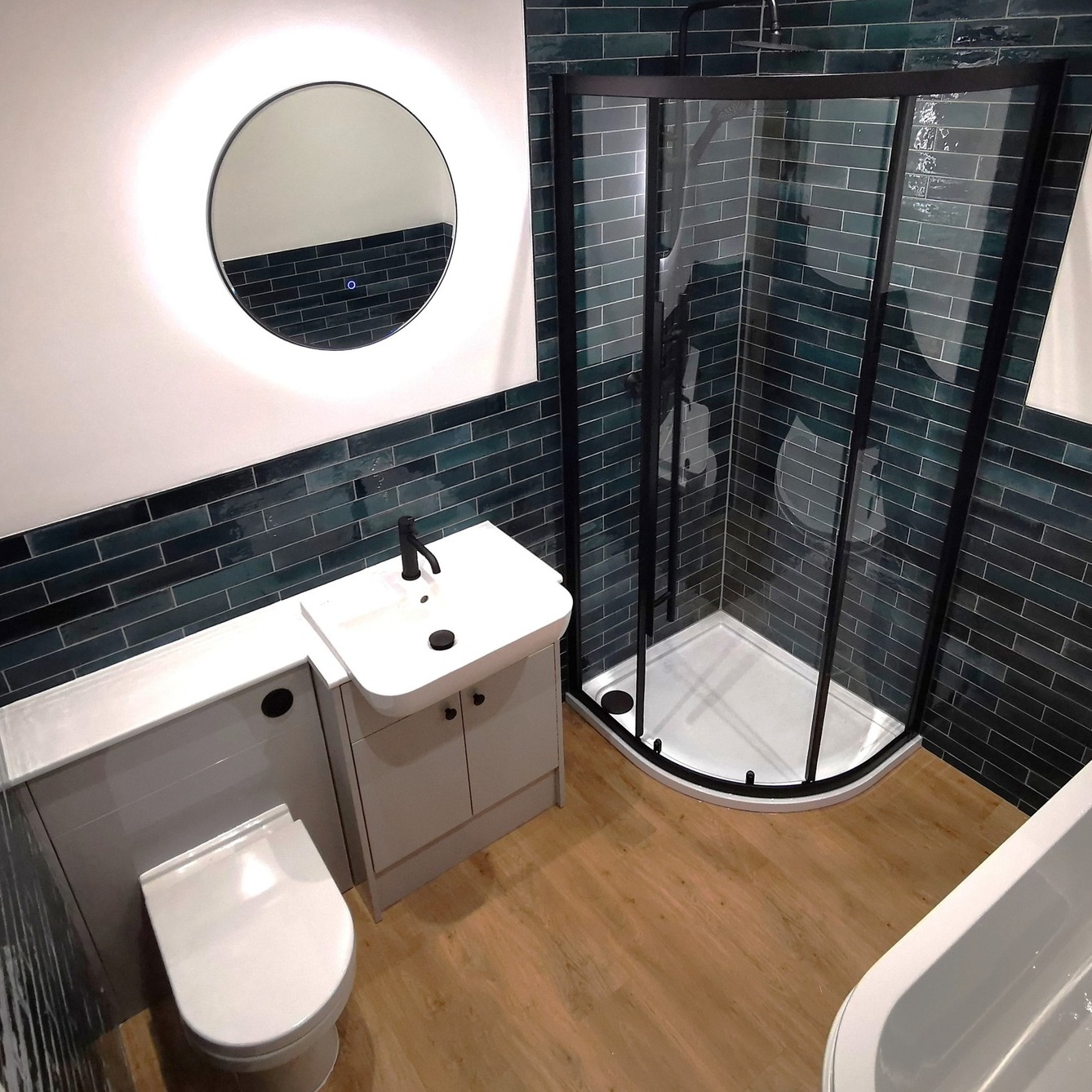 We are thrilled to share our latest bathroom transformation! Our lovely customer went for a modern, yet warm and inviting feel, combining striking matt black fittings with gorgeous dark blue-green brick tiles. The vinyl oak flooring adds a touch of natural cosiness, perfectly complementing the sleek curved bath. Not only does the bath create a softer overall look, but it’s also designed for easy access into the room. Absolutely loving how these elements come together for a space that’s both stylish and practical!
This bathroom started out much larger and had a lot of wasted space. We reduced the size by installing a new studwork which results in a much more usable space outside of the room.
Congratulations to the team on a successful project. Jamie and Adam on the main fitting, while Glenn and his crew completed the plastering, Damien on electrics and Dave handled the decoration. We appreciate Squeaky Clean for providing a thorough cleaning of the entire house upon completion.
www.goodwinskbb.co.uk
#BathroomRefurb #HomeInspo #ModernLiving
#teamgoodwin #berryallocflooring #SmallBathroomSolutions #BrightSpaces #CustomerSatisfaction #tavistock #bathrooms #BathroomRenovation #DreamBathroom #somethingdifferent #BathroomMakeover #Relaxation #Teamwork #EnSuite #bathroomideas #ModernDesign #InteriorDesign #HomeRenovation #happycustomer #SmartStorage #HomeImprovement #derbyshire