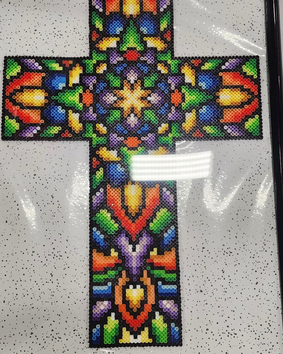 This project contains approximately 3,925 beads and took me 19 hours to complete. The frame size is 16 by 24