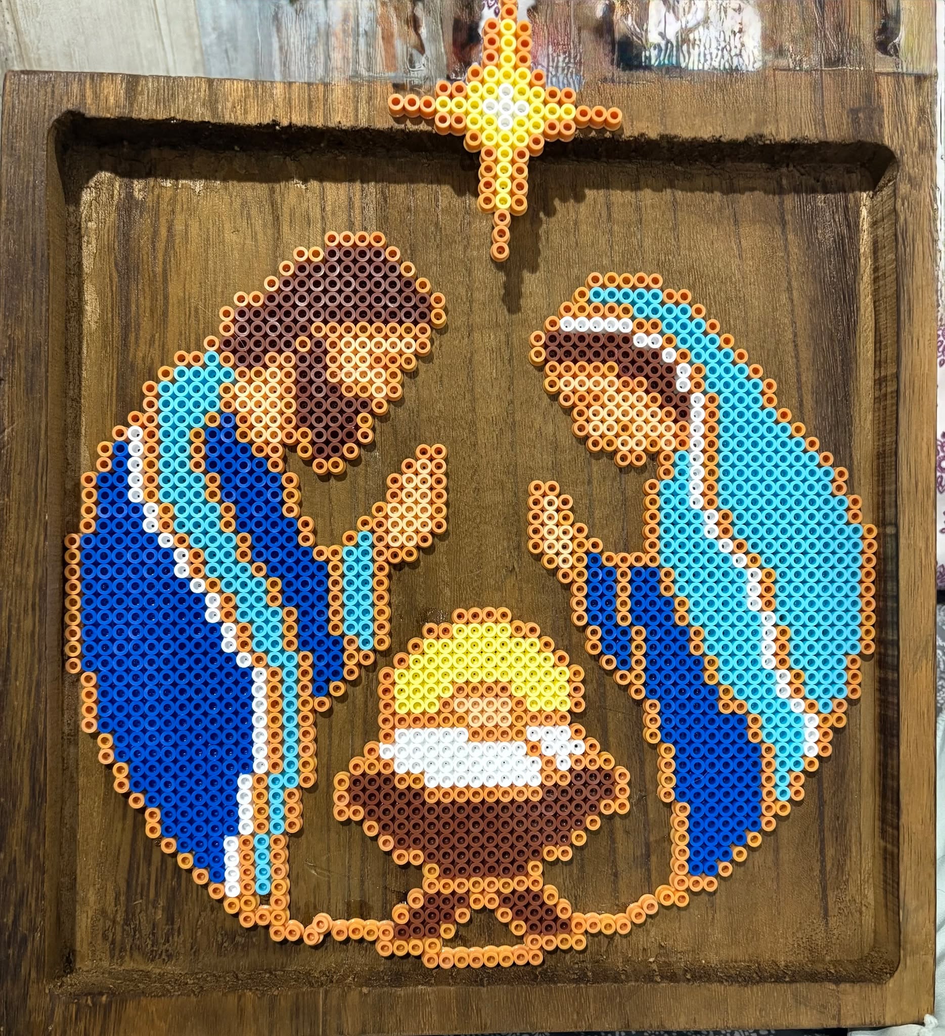 This project contains approximately 1,703 beads and took me 8 hours to complete. The frame size is 12 by 12.