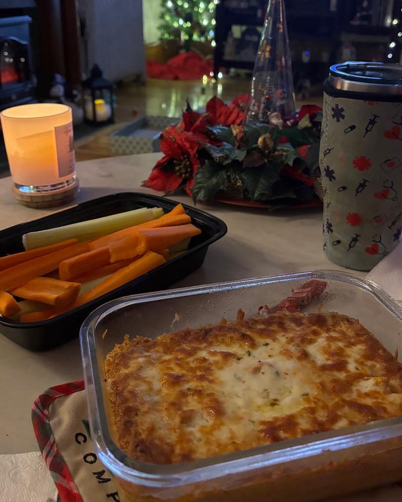 Healthier Buffalo Protein Dip
Creamy, tangy, and spicy baked buffalo dip with a big protein boost from chicken sausage, Greek yogurt, and Parmesan
Ingredients
Makes about 4 to 6 snack servings
• 2 Al Fresco chicken sausages, cooked and sliced
• 1 cup plain Greek yogurt
nonfat or full fat both work
• 4 ounces cream cheese
half a standard 8 ounce block
• 1/4 cup shredded Parmesan cheese
• 1/4 cup buffalo hot sauce, or to taste
• 1/2 teaspoon smoked paprika
• 1/2 teaspoon chili powder
• 1/2 teaspoon onion powder
Topping
• 1/2 to 3/4 cup shredded pepper jack cheese
add more if you like a thicker cheesy top
How to make it
1. Preheat oven to 350 degrees. Lightly grease a small glass baking dish.
2. Cook the chicken sausages if they are not already cooked.
3. Add sausage, Greek yogurt, cream cheese, Parmesan, hot sauce, smoked paprika, chili powder, and onion powder to a food processor.
4. Blend until mostly smooth. You can leave a little texture if you like it more chunky.
5. Spoon into your greased baking dish and spread evenly.
6. Sprinkle pepper jack over the top.
7. Bake 15 minutes, or until hot and bubbly. If you want extra browning, broil 1 to 2 minutes at the end, watching closely.
8. Let sit 5 minutes before dipping so it thickens slightly.
Serving ideas
• Celery sticks, carrot sticks, bell pepper strips
• Cucumber rounds
• High fiber crackers or seed crackers
• Sliced sourdough or pita if you want a heartier snack
Enjoy as a party or or game day treat!
#swap #party #game #abetterpathtowellness #nutritionist #buffalo #protein #cheesy