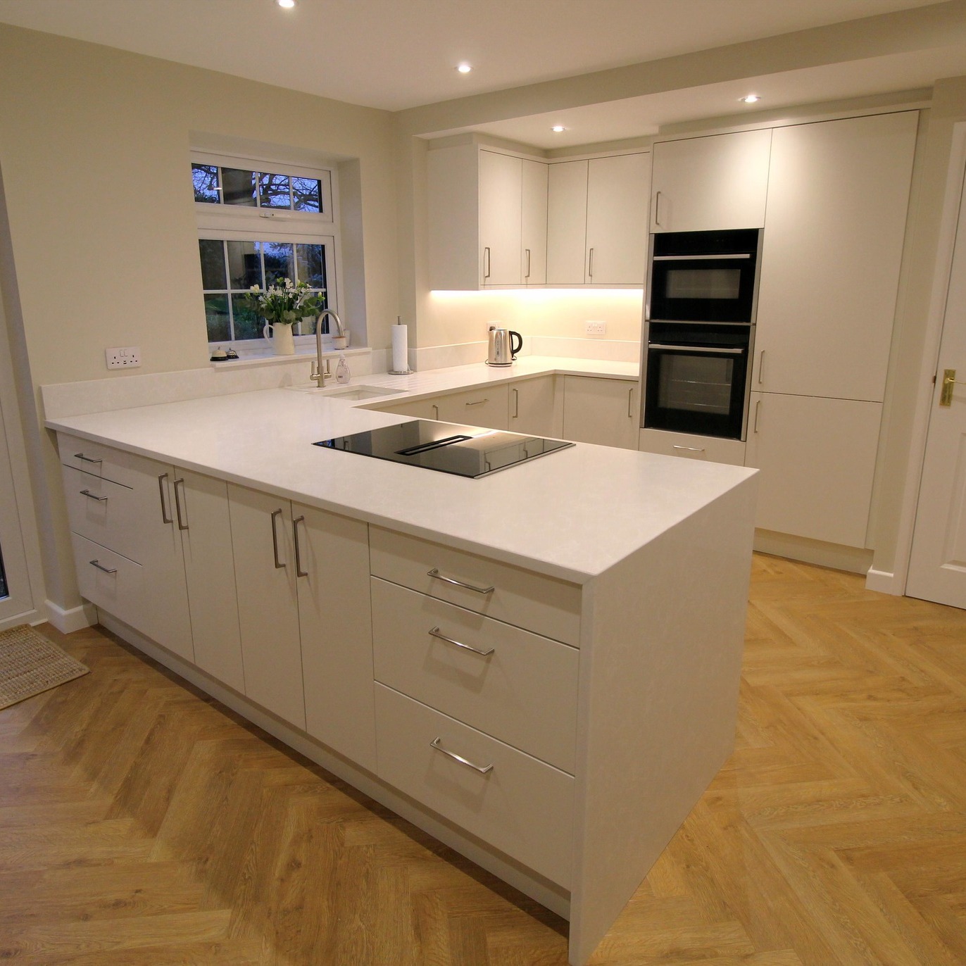 We are pleased to present the recent transformation of a kitchen and utility room completed as part of a comprehensive renovation project.
The layout was reconfigured by removing several walls, resulting in an open, contemporary kitchen designed to accommodate both entertaining and family activities. The project also included the expansion into the garage to construct a spacious walk-in pantry, featuring substantial shelving and additional freezer capacity to enhance storage solutions. A new downstairs shower room was added, equipped with a modern walk-in shower.
The installation of herringbone flooring provides a cohesive aesthetic throughout the area, while quartz worktops were selected for their timeless elegance and durability. Both our team and the client are highly satisfied with the finished result.
We would like to recognise the dedication and expertise of everyone involved: Jamie and Adam, Jim and Lee, Glenn, Danny & Keaton, Damo and the electrical team, as well as Jason and Will for their work painting all rooms.
www.goodwinskbb.co.uk
#KitchenGoals #HomeRenovation #PantryPerfect
#CustomerSatisfaction #derbyshire #StorageSolutions #ModernDesign #Teamwork #RenovationUpdate #InteriorDesign #SmartStorage #HomeImprovement #Littlegreenepaintcollection #BrightSpaces #happycustomer #littlegreenepaint #kitchensderbyshire #QualityCraftsmanship #Relaxation #teamgoodwin #BathroomMakeover #berryallocflooring #tavistock #bathrooms #BathroomRefurb #DreamBathroom #SmallBathroomSolutions #BathroomRenovation #WalkInShower #HomeRenovation