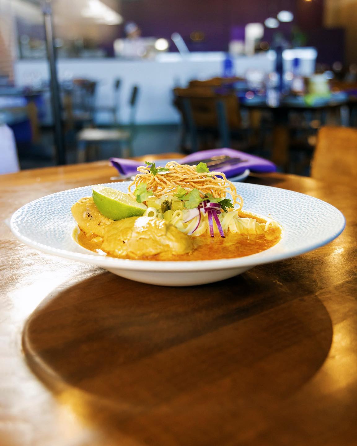 Introducing one of the newest additions to our Winter Menu, Khao Soi! This rich, creamy Thai curry chicken noodle soup features a flavorful red curry broth, tender bone-in chicken, served over egg noodles and topped with crispy noodles for added bite. A balance of sweet and savory with a touch of heat that is sure to warm you up properly during the winter months.
Available all day on our menu! Open for Lunch Tuesday-Saturday, 11am-2pm, and Dinner Tuesday-Saturday, 5-9pm.