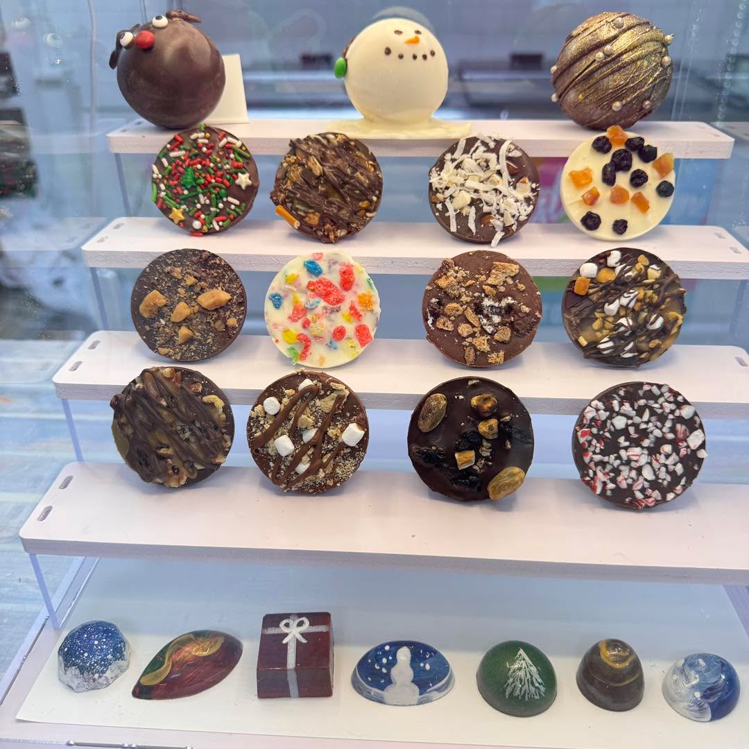 Tasty Toucan presents….Handcrafted chocolate! 12 different bark bites, 7 hand-painted bonbons and 3 super cute hot cocoa bombs all made here just like our ice cream and pops….stay tuned more to come!