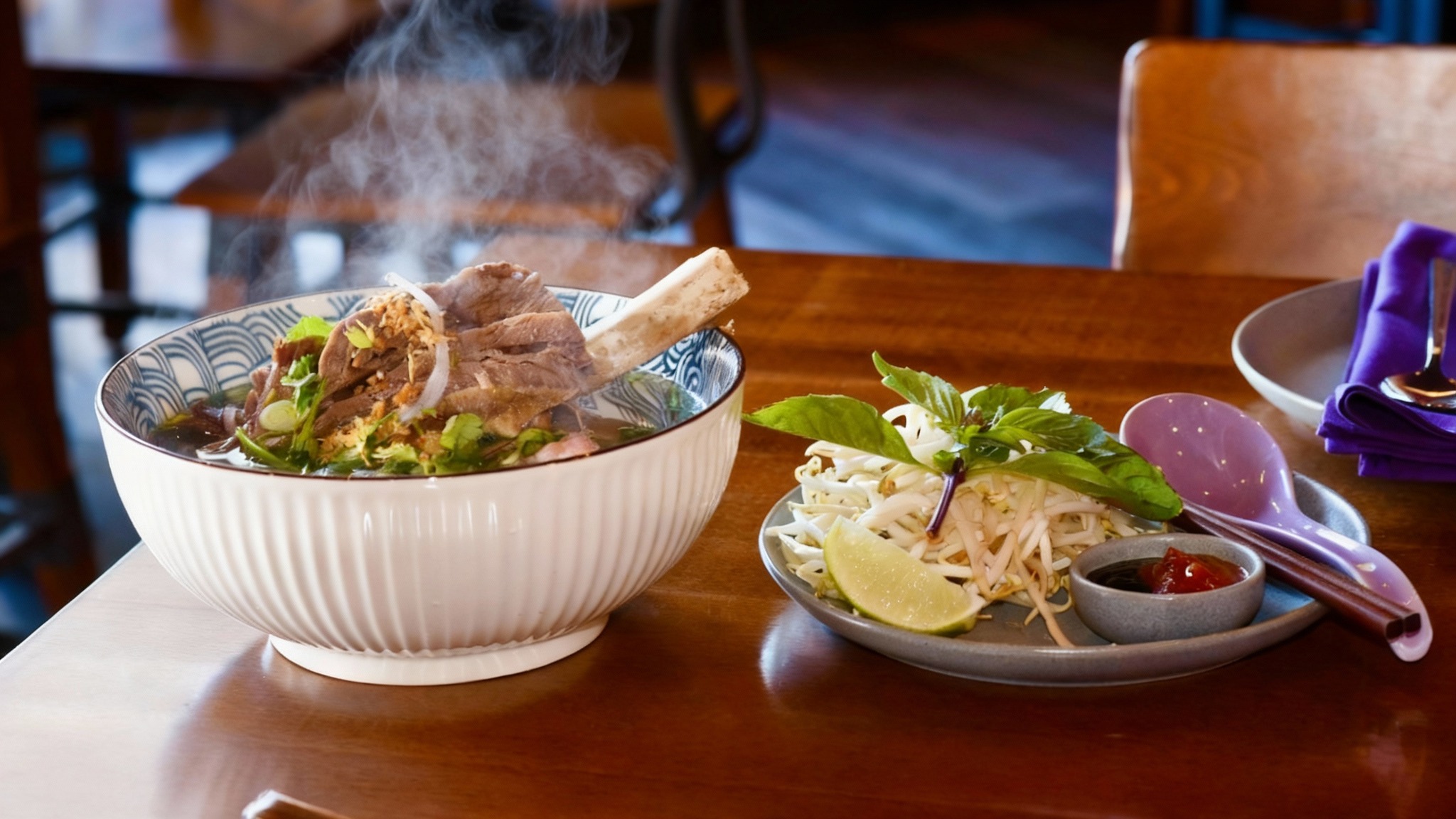 Baby, it’s cold outside! Which means it’s the best time to come in and enjoy a bowl of our great-grandmother's pho!
Our 10-hour bone broth cook is followed by a 24-hour simmer. This recipe was created by our Great Grandmother to yield a full body flavor with lots of nutrients. This will comfort and warm you from the inside out! Get the traditional bowl or “The Works” (bone-in) if you’re feeling really hungry!
Available all day on our menu! Open for Lunch Tuesday-Saturday, 11am-2pm, and Dinner Tuesday-Saturday, 5-9pm.
.
southeast asian food, southeast asian cuisine, asian food, asian cuisine, asian flavors, Thai food, Vietnamese food, Lao food, local eats, downtown rogers, NWA, Northwest Arkansas, food scene, local restaurant, local eats