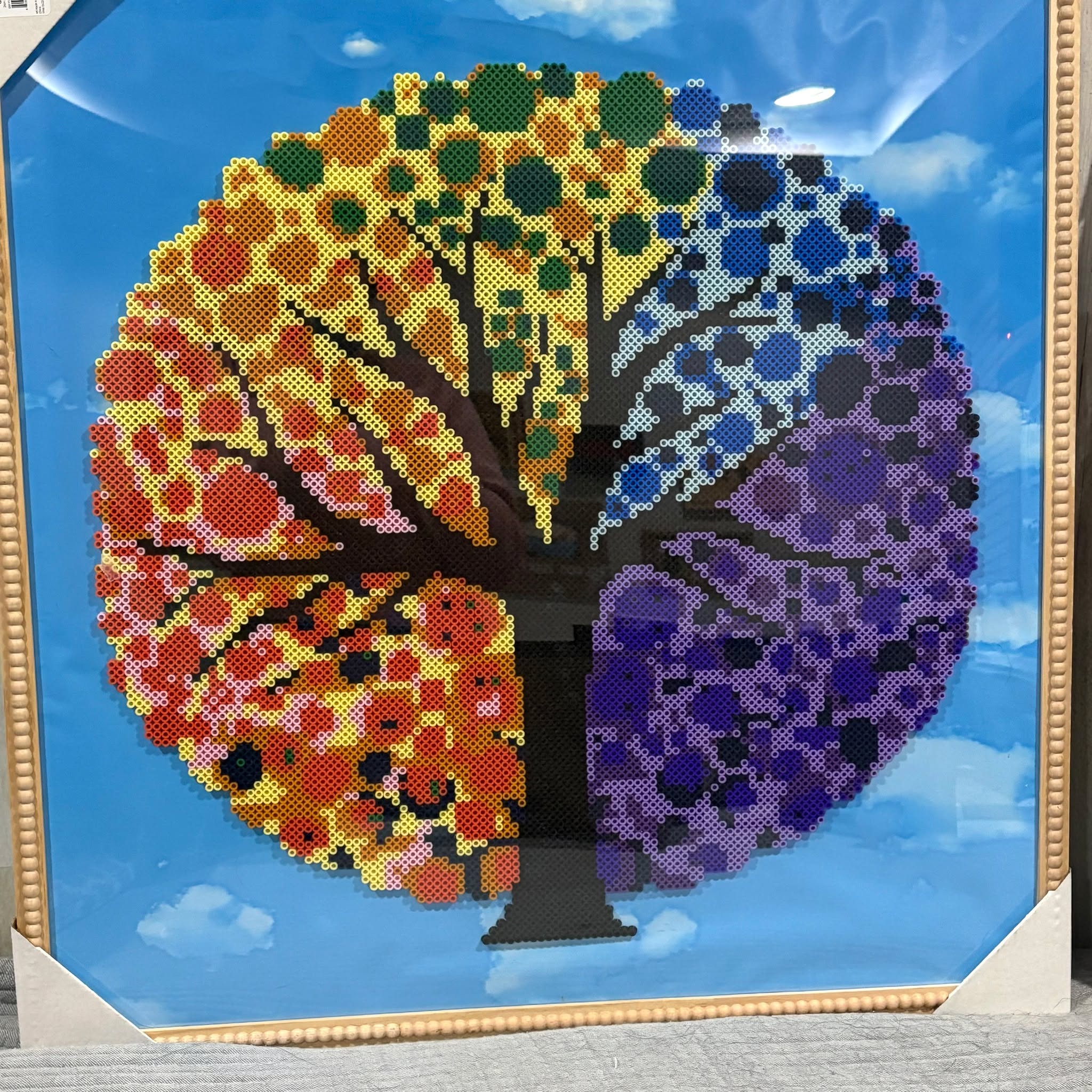 This project contains approximately 12,321 beads and took me 47 hours to complete. The frame size is 25 by 25.