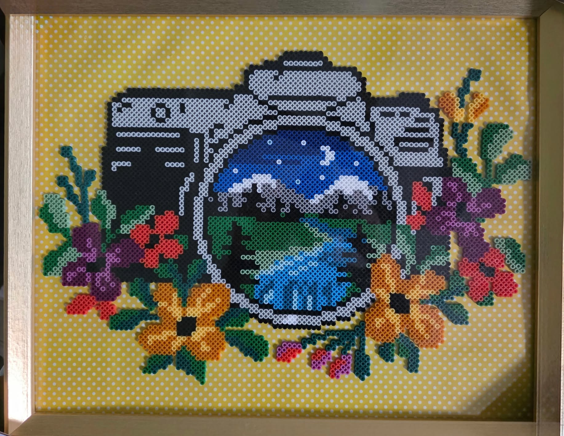 This project contains approximately 7,107 beads and took me 20 hours to complete. The frame size is 17 by 21