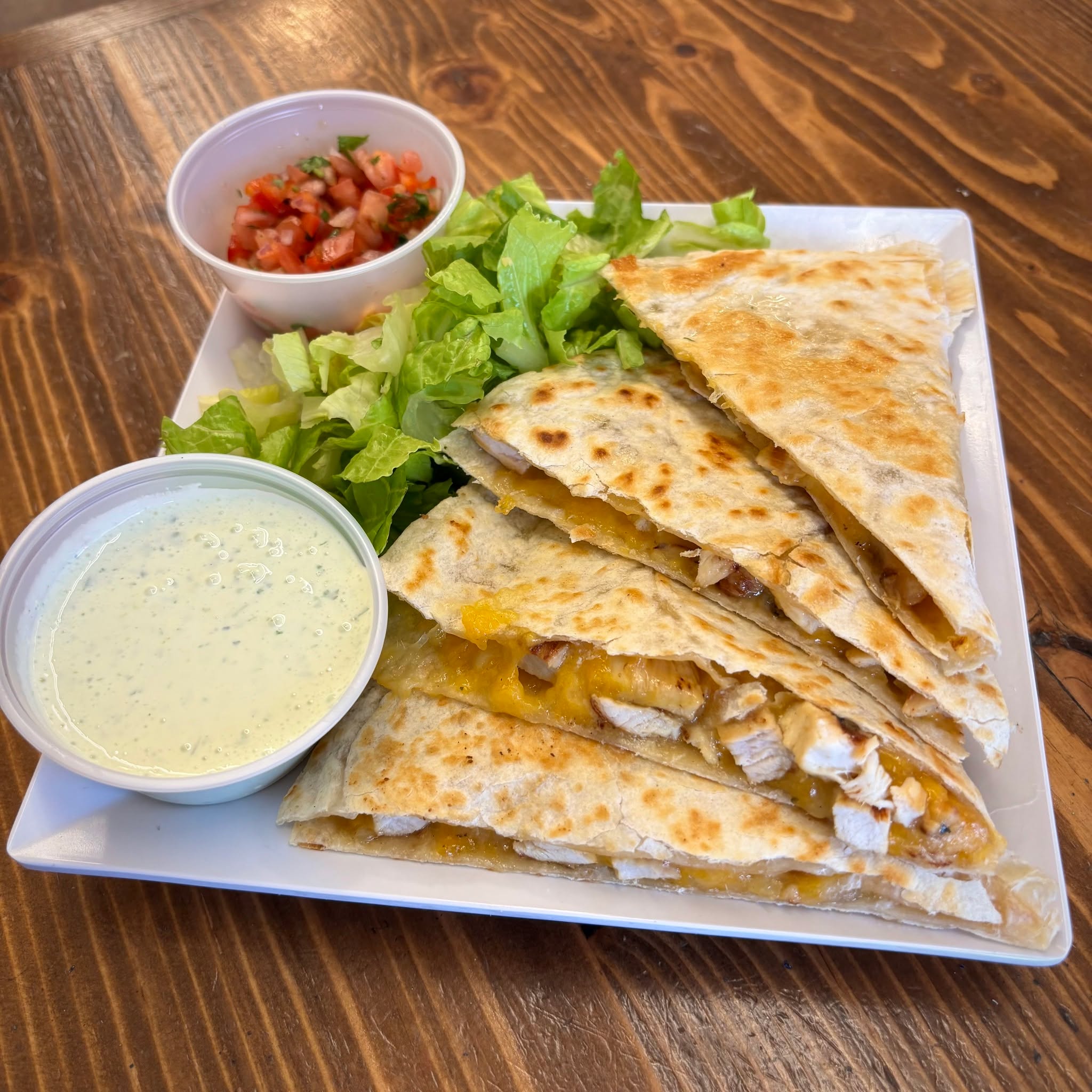 Escape the snow & cold weather by trying this week’s deli special, our Cilantro Citrus Grilled Chicken! With your choice of a quesadilla or bowl, it delivers a bright, delicious burst of flavor.
Order online, call ahead, or stop in to get yours!