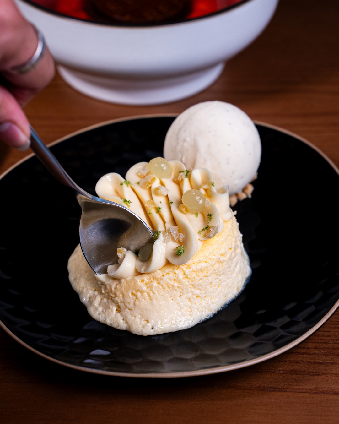 Fluffy Japanese cheesecake, yuzu ganache, vanilla ice creamโgood luck โjust having a bite.โ โจ
Available only at Reif Dar Wasl.