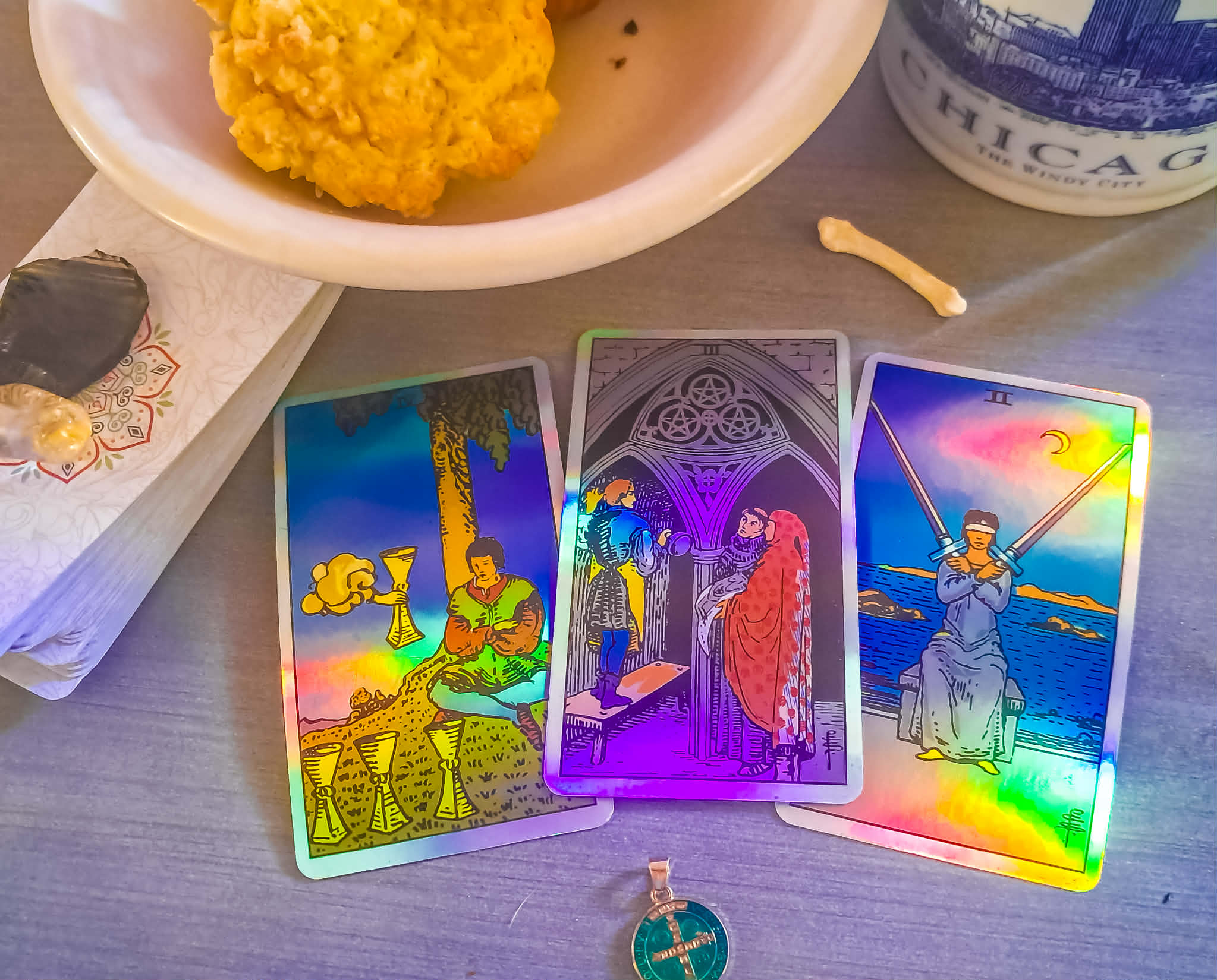 COMMUNITY TAROT- Energy for Dec 21st
First of all... BLESSED YULE, EVERYONE!
If you look closely at the photos I share each morning, there are always small clues tucked inside them.
Little pieces of what I’m working on.
What I’m tending.
What I’m offering.
The cards are never separate from my life—they’re pulled in the middle of it.
This morning had me baking muffins before the day fully began. Food as offering—for the Mothers, for the Beloved Dead, and for my family after a heavy emotional day yesterday. Care made tangible. Nourishment as prayer.
And that feeling threads straight through today’s cards.
General Energy — Three of Pentacles (center)
Today is about working together. Not doing everything alone. Not carrying it all in silence. This card speaks to collaboration, shared effort, and building something meaningful side by side. Whether that’s family, community, or chosen kin—what we create today is stronger because it’s shared.
Energy to Lean Into — Four of Cups (left)
Lean into presence. Pause long enough to notice what’s already being offered. This isn’t withdrawal—it’s discernment. Let yourself feel. Let yourself reflect. There is quiet clarity available today if you allow yourself to actually receive it instead of rushing past it.
Energy to Deter — Two of Swords (right)
Avoid indecision and emotional stalemates. Don’t lock yourself into avoidance or delay because choosing feels uncomfortable. Today asks for honest movement, not frozen neutrality. Even small decisions made together are better than standing still alone.
This is deeply Yule-aligned energy—family, community, warmth, shared labor, shared meals, shared responsibility. We move through the dark season together, not apart.
Summary
Today is about collaboration over isolation, presence over avoidance, and choosing connection instead of indecision. Work together. Feed each other. Build something steady—one small, intentional act at a time.
#CommunityTarot #DailyTarot #TarotForTheCollective #YuleEnergy
#WinterSolsticeVibes #AncestralWork #SacredDailyLife
#SpiritualCommunity #TogetherWeBuild #RootedPractice
#TarotReflection #SeasonOfTogetherness