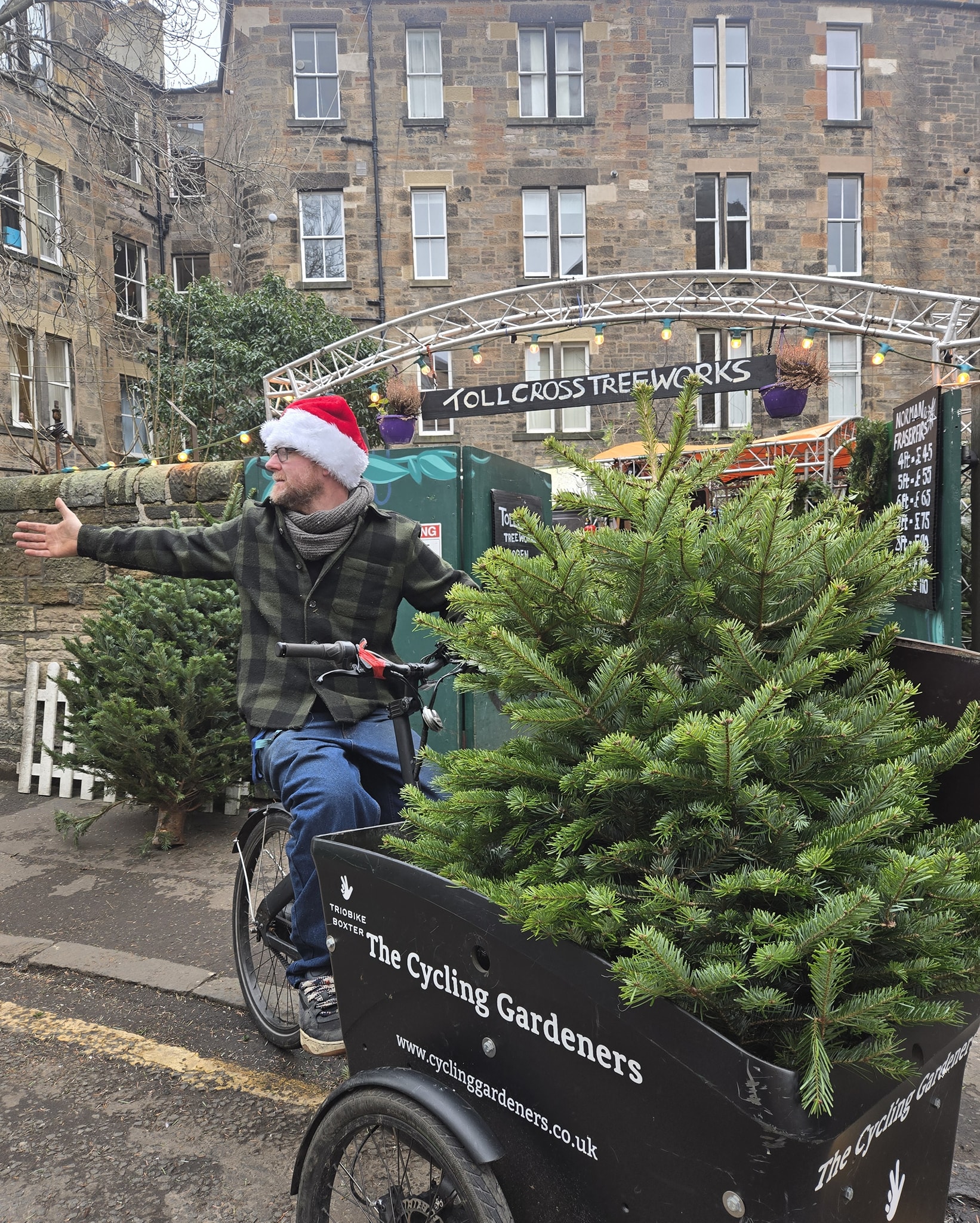 Cycling Gardeners delivering Xmas Trees using the awsome Trio Bikes, with non stop back up support from. GM4X