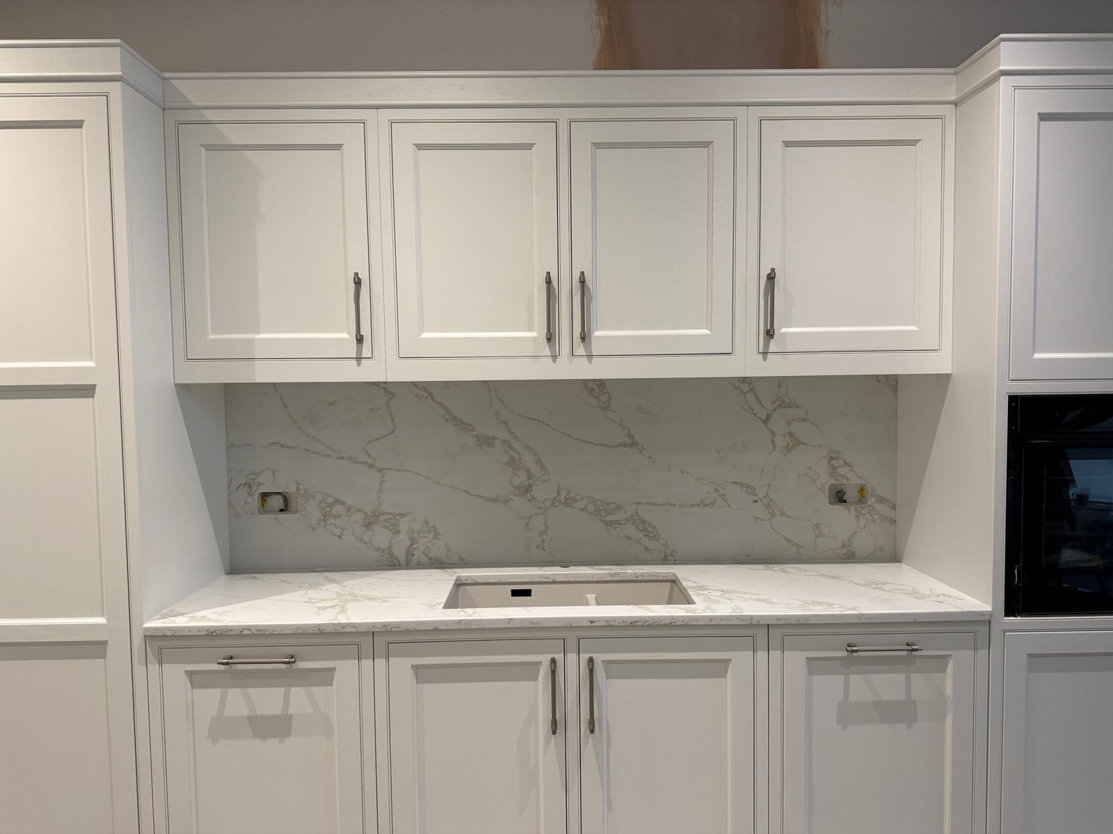 Qstone Celestial Gold worktops and splashbacks fitted in Warrington