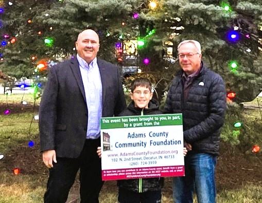 Mayor Dan Rickord is with Will Summers, official Tree Lighter, and Craig Coshow, Executive Director of the Chamber Commerce. Linda Morris, Decatur Chamber Assistance Director and grant writer extended a special thank you to the Adams County Community Foundation for the grant that provided support to the Christmas Tree Lighting which was made possible by the Adams County Community Foundation, DHS Class of 1957, Clete and Bette Miller, and the John and Rose Miller Community Enrichment Funds.
The Christmas Tree Lighting Event took place in Downtown Decatur on November 21 with Santa, Gingerbread Man, and the Grinch, and many volunteers to make this event special for our community and children.
