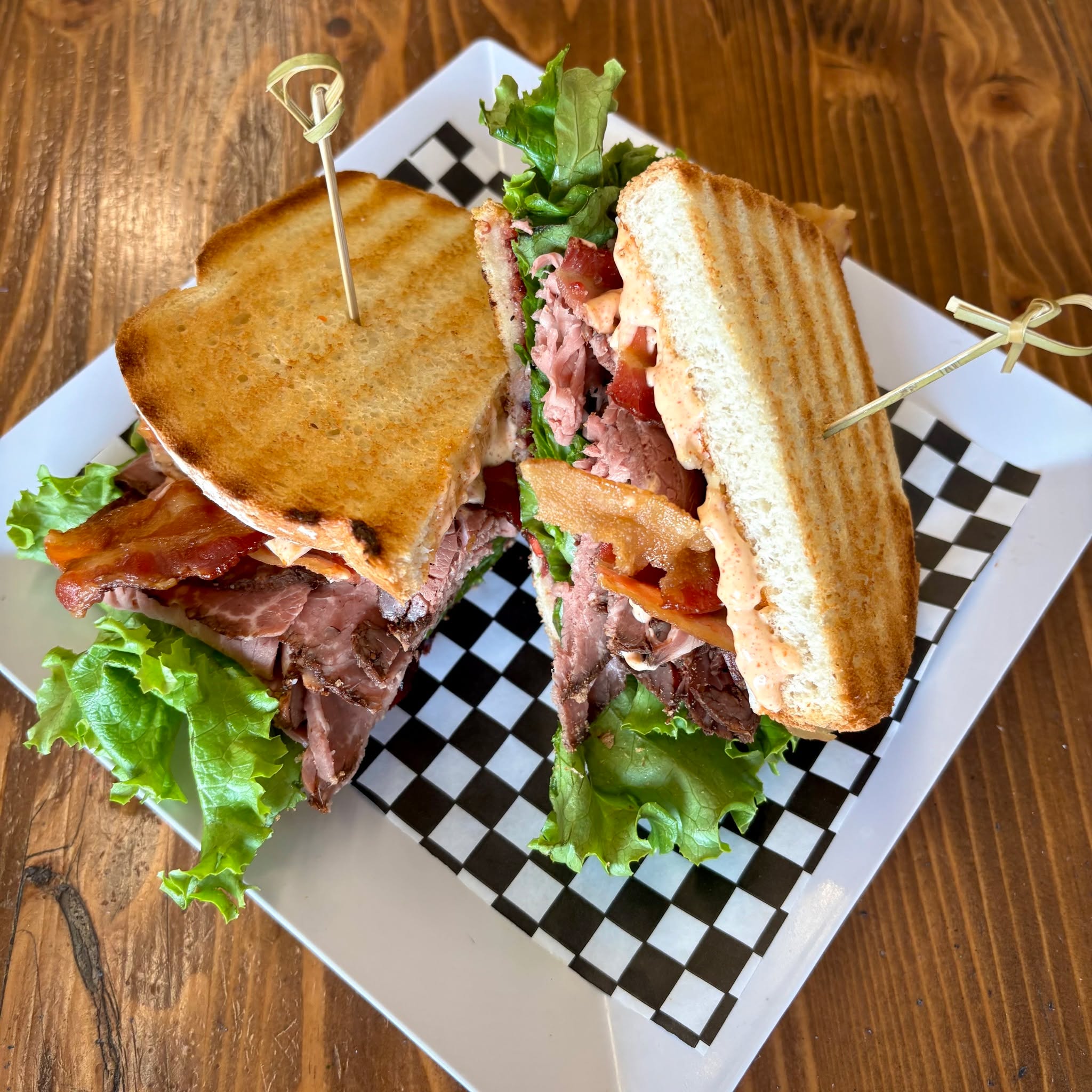 Start the new year off with bold bites & zero apologies!
Meet this week’s special, The RBF (Roast Beef Fusion) — Roast Beef, American Cheese, Crispy Bacon, Lettuce, House-Made Pomegranate Spread & House-Made Chipotle Mayo on Toasted White Bread 🥪
Stop in, order online, or call ahead to try this tasty sandwich!