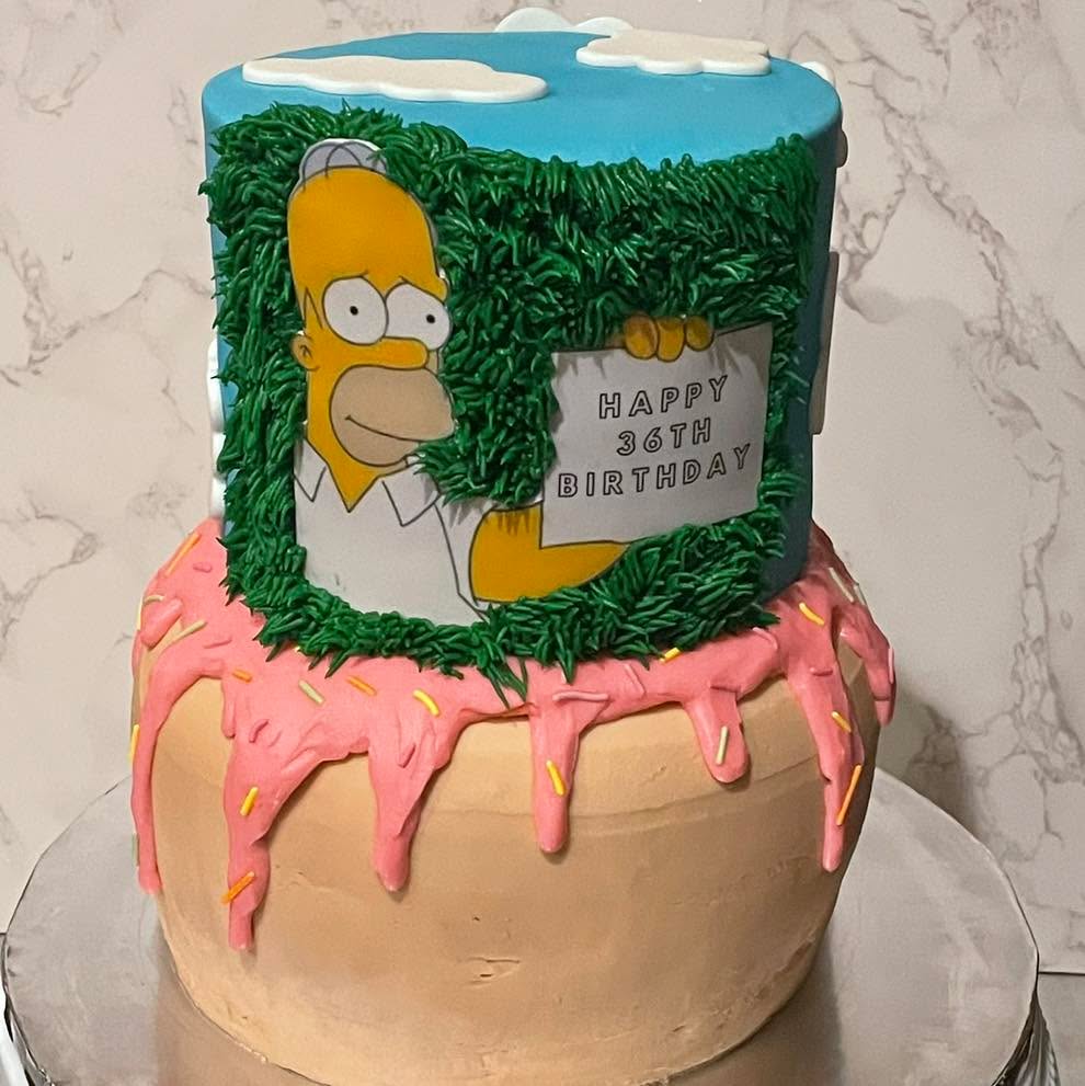 Homer Simpson and a donut 🍩 cake wishing a lucky someone a Happy 36th (now 37th) Birthday!!! #throwbackmemories #oneyearago #ChallengeAccepted #bdaycelebrations #lynchburgbaker #frosteatlove