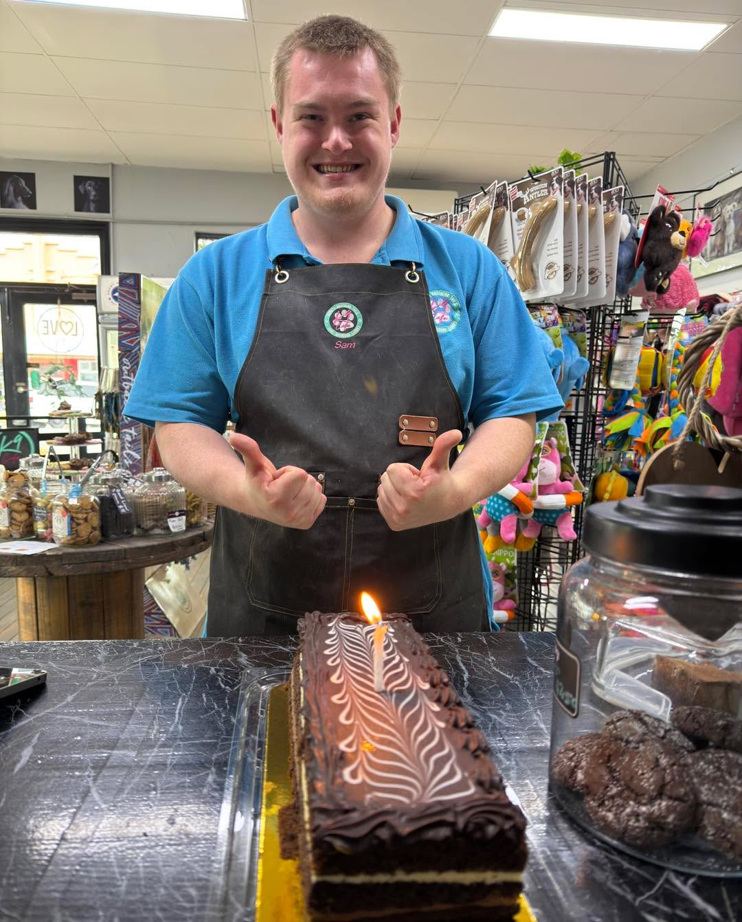 🎉🎈 Happiest Birthday to our very own “Super Sam”! 🥳
For those of you who haven’t had the pleasure of meeting Sam yet, you’re truly missing out!!
He’s a vital part of the Sandy’s Grooming Tails & K9 Cafe family. Sam is the one who ensures every pup leaves squeaky clean, takes them for strolls around the block, hosts fun play sessions in our K9 social area, and is always here bright and early to prep the shop for everyone’s enjoyment. He always greets both dogs and people with a friendly smile, making everyone feel welcome!
Thank you Sam for being part of the best team ever🐾💖 you certainly keep us smiling 😊
Sandy, Judie, Michelle, Sharon, Madi & Edie