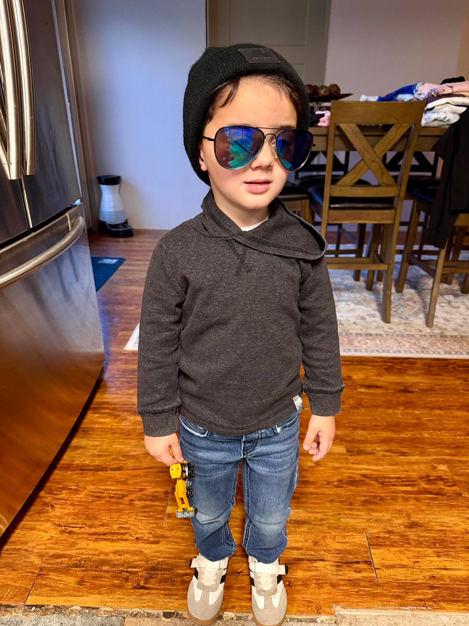 I’m in the living room when I hear Johnny chanting, “You can do this, Johnny!” over and over. Concerned, and even a little bit curious, I go to check it out.
I find my son giving himself a full-blown motivational pep talk… on the toilet… mid-poop.
I’m a grown man with some pretty awesome accomplishments. Yet, this is where im at on a Friday night, this is peak dad duty. I’ve made peace with it. (Pic for attention to the little poop monster yelling at himself)