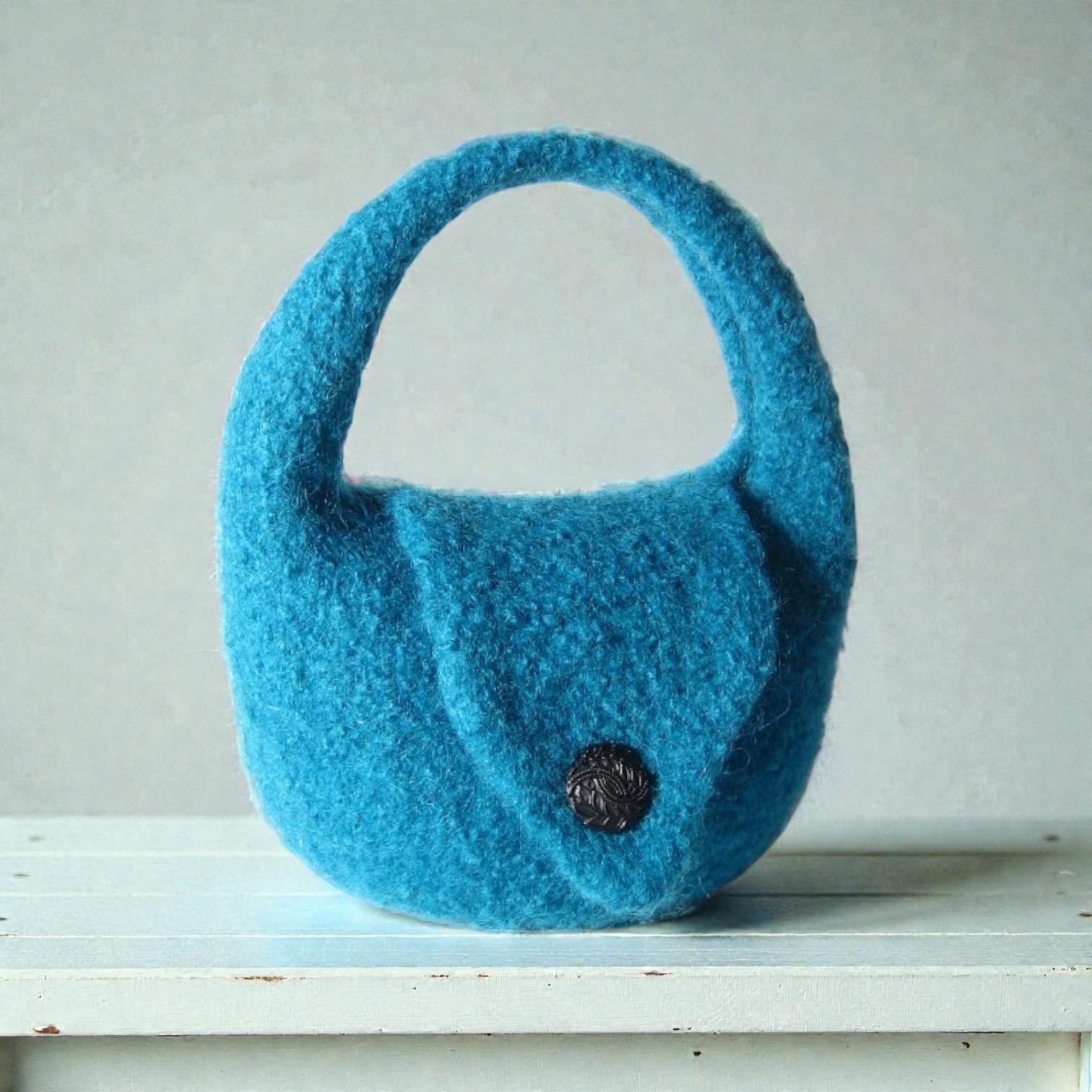 For this week’s Free Pattern Friday, I’m sharing something a little different—a chance to try your hand at knit and felt! Have you ever been tempted to give it a go?
This cute little bag pattern is just the thing for beginners and only uses three 50g balls of felting yarn—simple, fun, and a great way to try something new.
Why not start the year by learning a new skill? I’d love to see your creations—let me know if you’re giving knit and felt a try!
Just click the link - no need to enter a code!
https://www.ravelry.com/redeem/claire-fairall-designs?code=FPFfeltbag