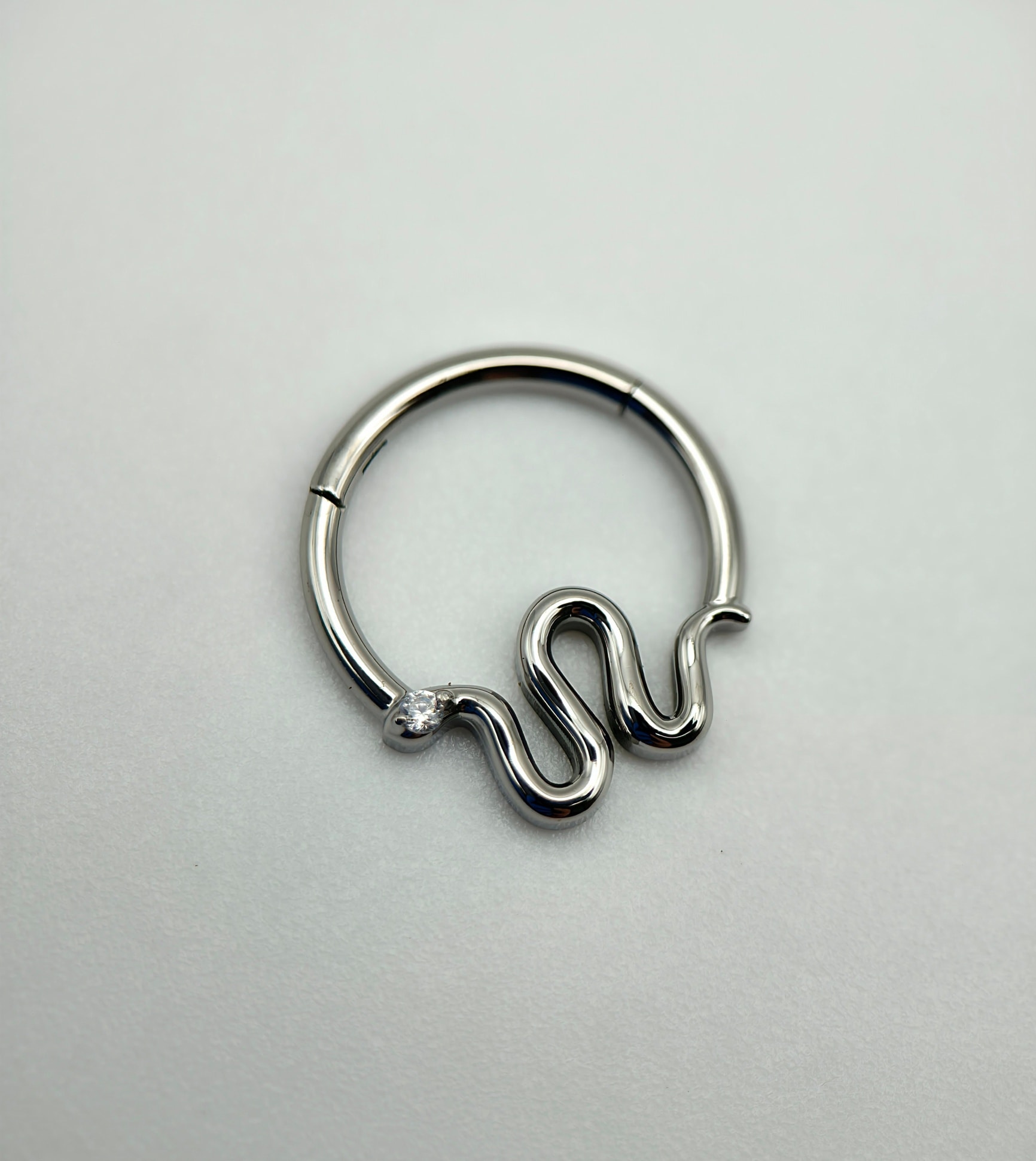 🐍 this lil' snake is looking for a new home, perfect for a daith or a septum piercing