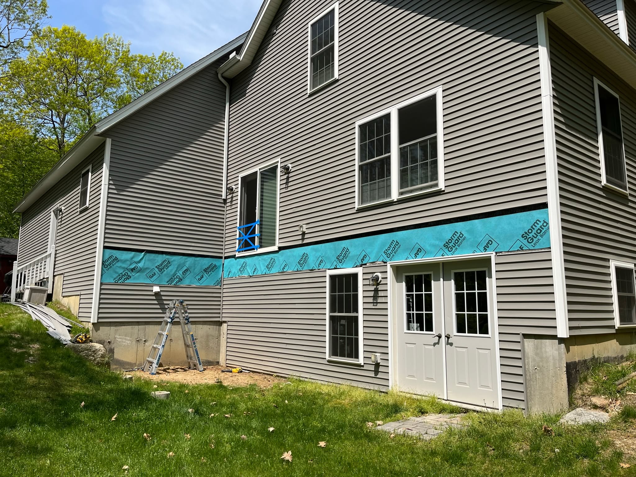 Why ledger board protection matters more than you think 🧠🔨
One of the most critical — and most overlooked — parts of a deck isn’t what you see… it’s what’s between the deck and the house.
When installing a ledger board, a full layer of protection (proper flashing + waterproof membrane) is essential. Without it, moisture can get trapped between the deck and your home, leading to rot, mold, and serious structural issues over time.
Here’s why we never skip this step:
• Prevents water intrusion
• Protects your home’s framing and sheathing
• Extends the life of the deck AND the house
• Meets modern building code requirements
Skipping proper ledger protection might save time up front — but it almost always costs more later.
This is one of those details you’ll never see once the deck is built…
but you’ll absolutely feel it if it’s done wrong.
Built right. Built to last.
#WisdomWednesday #DeckBuilding #NHContractor
#BuiltRight #DeckDetails #ConstructionMatters
#NewHampshireHomes #QualityConstruction