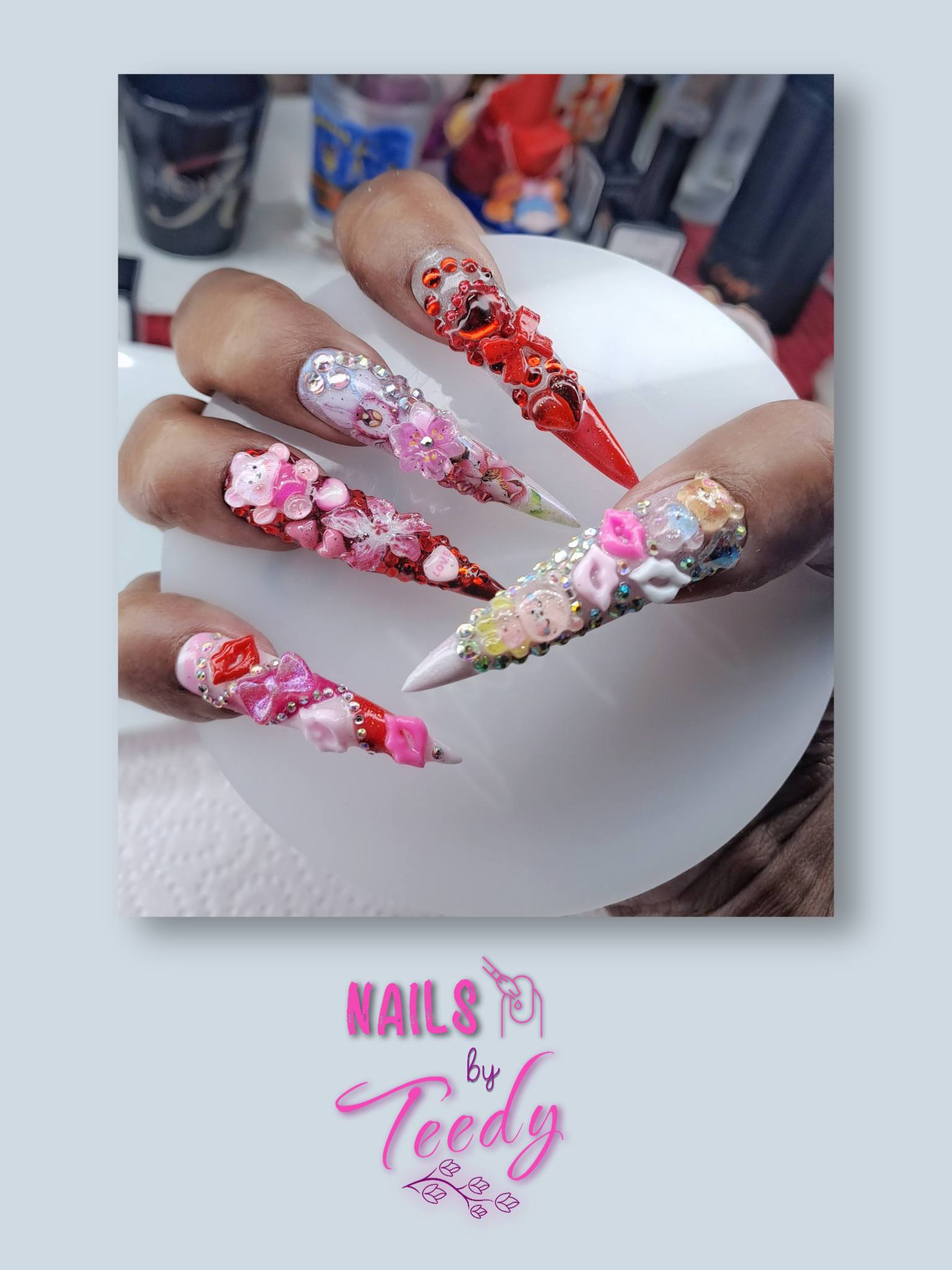 I'm bouncing back to slightly less than dumpster fire one week after the first infusion. I'm stir crazy and add in the fact that I've been home since November, so I've had the overactive crazy brain at work. To keep my mind calm I've been in the Cone Of Chaos nail studio creating sets of nails to test new techniques and for some friends who have asked me for some party, press-on sets. After about 4 sets, I thought it would be a great idea 💡 (insert side eye here) to try out the box of XXL stiletto tips on myself with Valentine's Day decorations. 😐 I've worn XL for a little over a year but this length seems like a big jump in size. I've always functioned well with long nails but these..... madness!😂😂😬