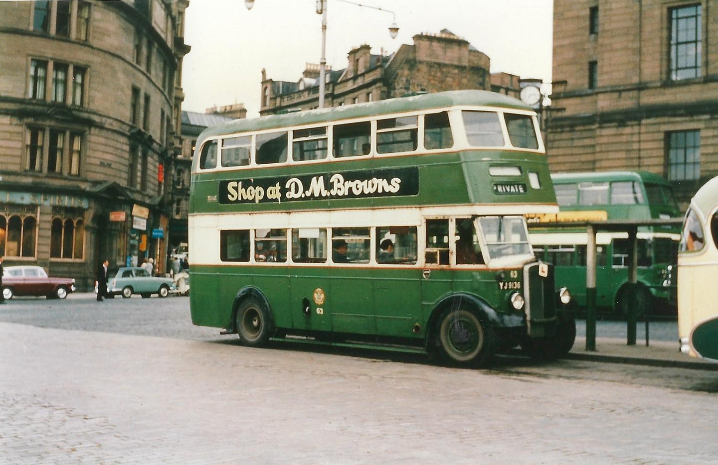🚌📖 Today’s historic image features a Dundee Corporation double decker, Fleet Number 64 (YJ9136), an AEC Regent III with MCCW bodywork. New in 1947 and scrapped in 1968, it represents one of the earlier post-war buses that helped keep Dundee moving through a period of major change.
Captured offside on Dock Street, Dundee, the photograph places the bus within a busy city setting, with surrounding architecture and street life adding valuable context to how public transport fitted into everyday routines.