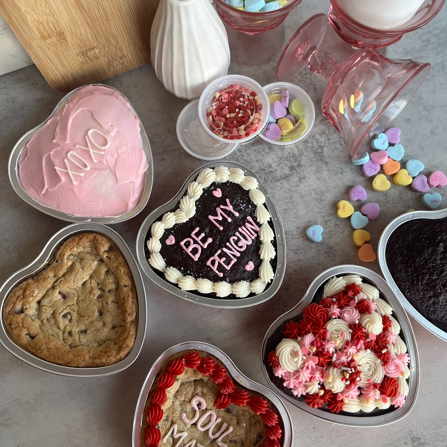 Today is the LAST day to place an order in time for Valentine's Day!!!
Currently, the only options are for pickup February 14th between 8:30 and 9:15 OR Friday at 6:30 PM ONLY (note this request under special requests as this is not currently an option).
NOTE: Pick up is now from the Joe Bean's on Timberlake Road
Check out the sugar cookie decorating kit, custom chocolate chip cookie cakes, and the year-round client favorite: the build-your-own 8" vintage heart cake! Go to FrostEatLove.net/online-ordering to place your order.