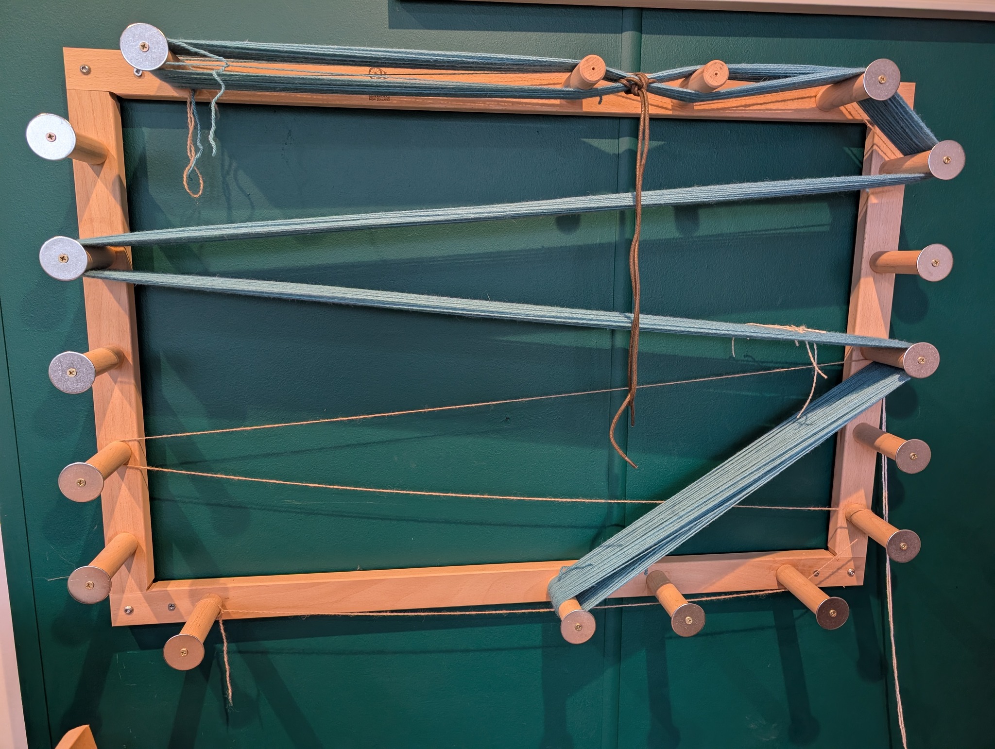 Something that was missing last year was time to weave more on my floor loom. So I want to make that a priority this year. The investment is in the warping which is quite a time consuming process, especially as it's still not natural to me - unlike a rigid heddle that I can warp with ease. A visitor to the studio who was also a weaver suggested I focus on warping short warps so I have to do it more often and therefore learn.
So this week I took her advice and have warped a 3m warp. Some bits were stressful, others were ok and I've succeeded in getting the loom warped. My reward was to start the weaving with a yarn I have hand spun. I know it won't take long to complete, far less than the time taken to warp. Once I feel more confident with the warping, I'll be able to have longer warps - yah!
#handspunyarn #handwoven #louet #weaving #learningisfun