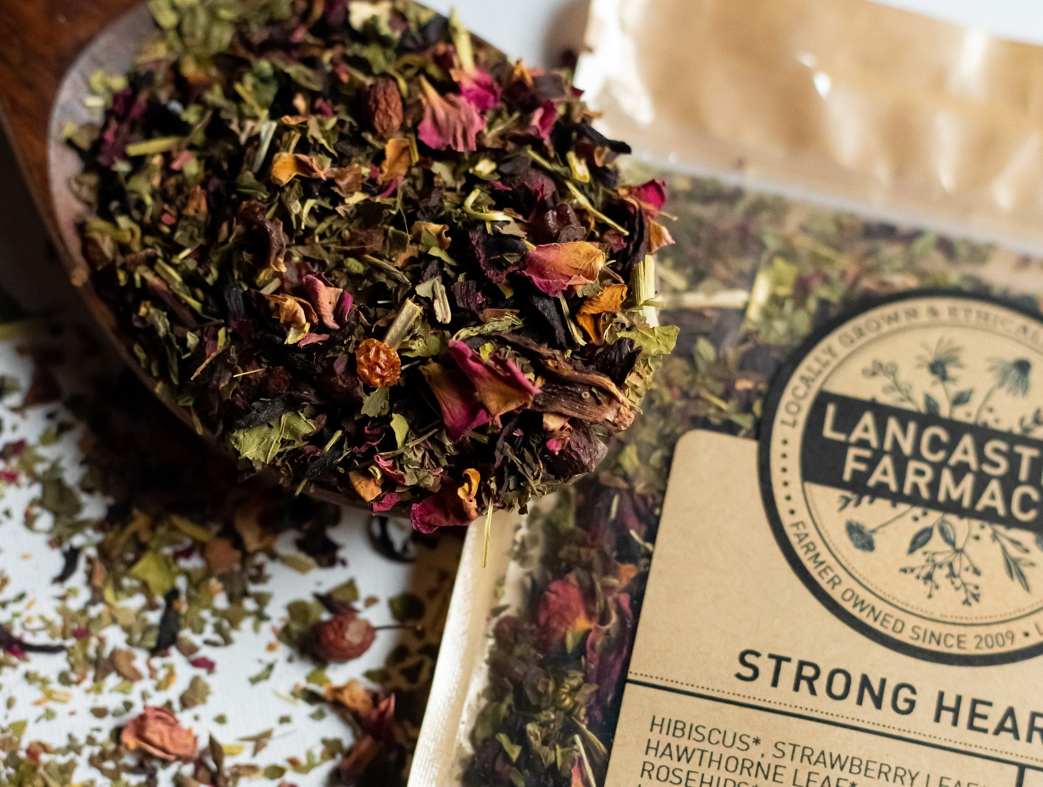 💕Strong Heart is a special blend we love to drink all year round but it is a favorite for this upcoming Valentine's Day. 💕
The final color of this tea when steeped is worth the experience alone, but the taste is incredibly delicious too! The herbs in this blend are known to help strengthen and open the heart. Hibiscus, rose petals, and rosehips are what gives this tea its rich color and flavor. Sweet and tart, loaded with vitamin C. Hawthorne is a medicinal tree that the leaf and berry is harvested from. The leaves are harvested in the spring and the berries are harvested after the first frost in the fall. It is one of the best herbs for treating heart related illness. It is commonly used to help recuperation from heart surgery, heart attack, and heart disease. It helps to regulate blood pressure and promotes a general sense of openhearted well being. Passionflower and lemon balm are both helpful nervines to help reduce stress and aid the heart in being more open.
Ingredients for this tea are:
Hibiscus*, hawthorne leaf and berry*, strawberry leaf*, rosehips*, passionflower*, lemon balm*, rose petals*, orange peel* Check out the beautiful photos featuring passionflower and hibiscus rosettes!
*organic
https://www.lancasterfarmacy.com/product-page/strong-heart
Stop by Lemon Street Market in Lancaster Saturday 2/7 to sample some of this tasty tea from 12-2pm.