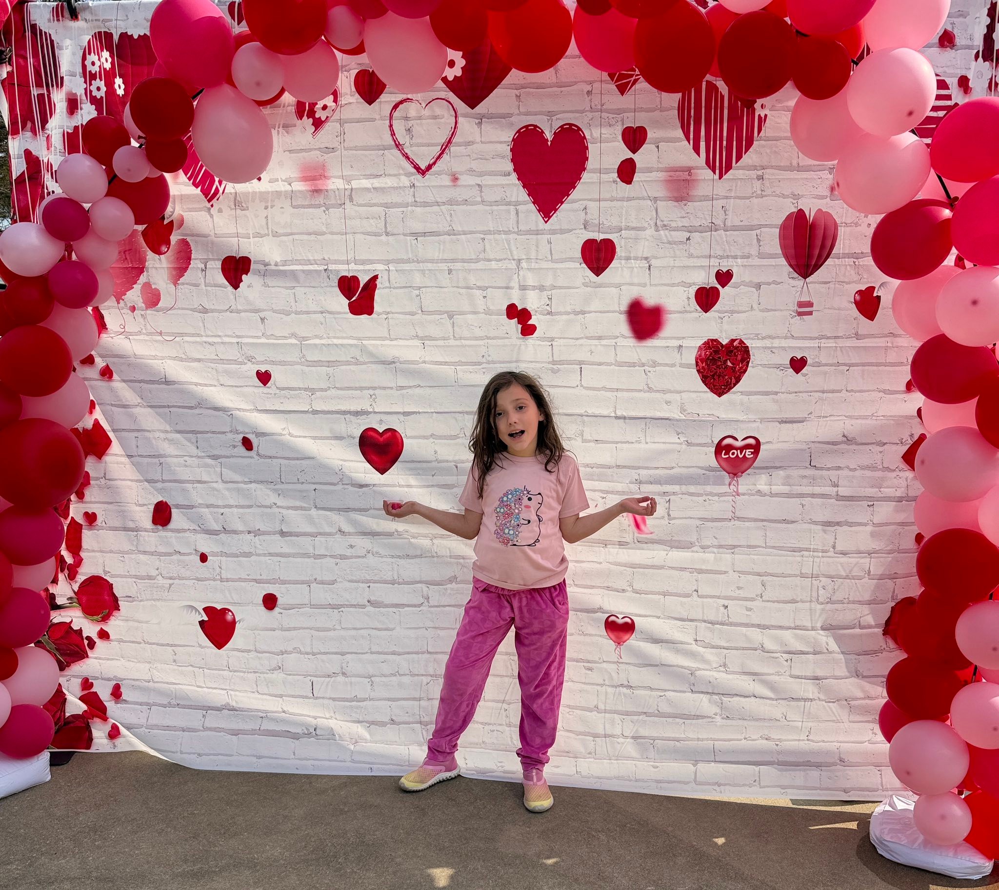 Yesterday, my best valentine invited me to her Valentine’s Day Party at school. We had a blast! But today she woke up with a horrible earache, so we spent the morning at Urgent Care.
So we’re spending the rest of our Valentine’s Day with an ear infection in our couch fort and watching David.