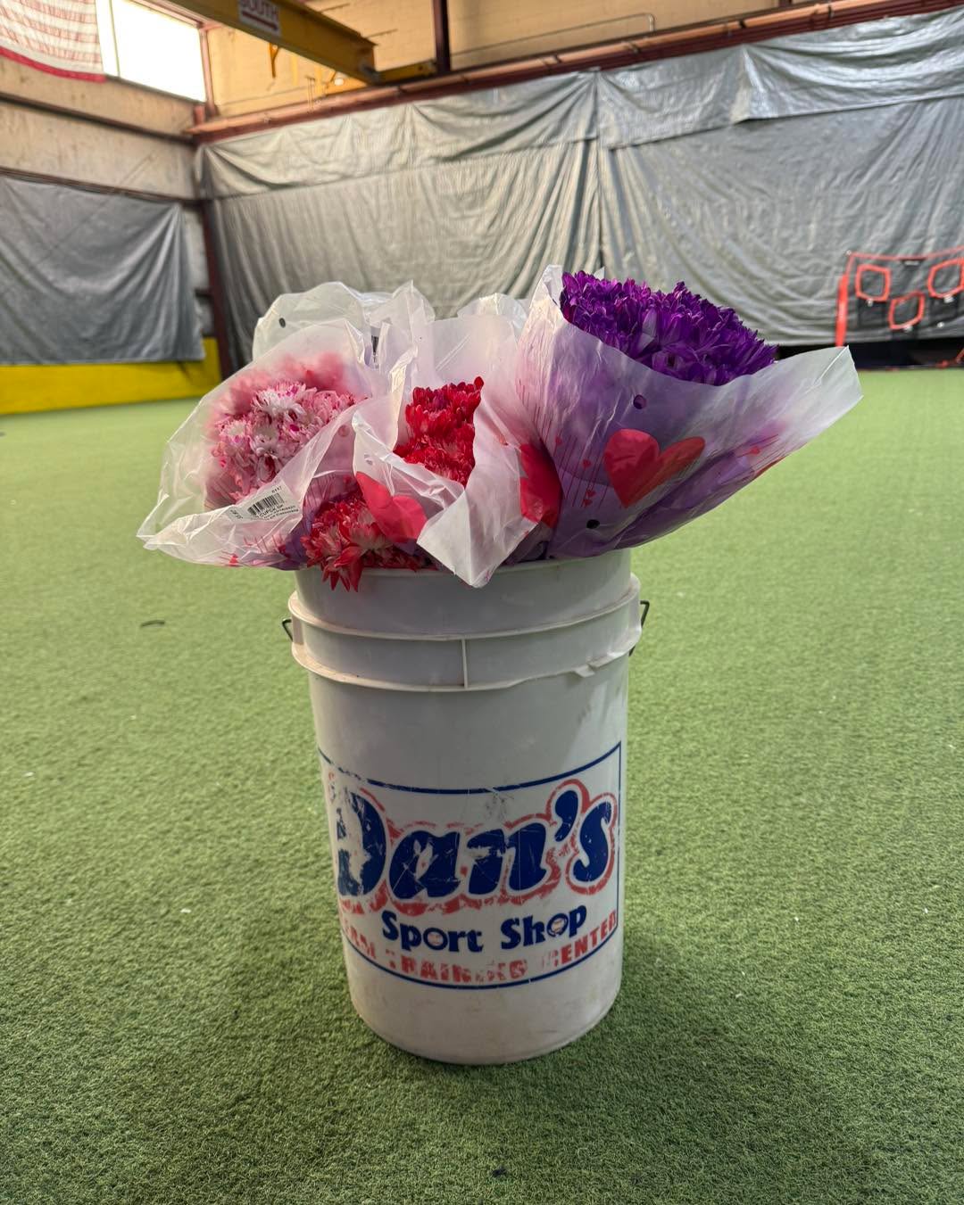 ❤️⚾ Roses are red… buckets are white… softball and baseball season is almost in sight. ⚾❤️
This Valentine’s Day, we’re showing a little love to the real MVP — the bucket that carries it all.
Like I always say…
“You can judge the quality of a team by the bucket they carry.” 😉
Whether it’s filled with baseballs, softballs, or (just for today) roses, a Dan’s Sport Shop bucket means you’re serious about your game.
Pic credit to Brooke Jeffery and her Alpha girls. Tag your favorite player, coach, or teammate who always shows up carrying the bucket. 💪🥎⚾
Happy Valentine’s Day from all of us at Dan’s Sport Shop — where we love the game as much as you do.
❤️
#danssportshop #shoplocal #dansbucket