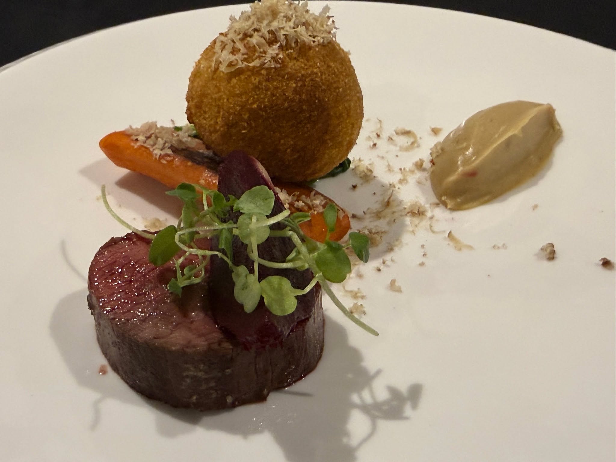 I do love venison and enjoy cooking it all year long, however there is always something about cooking it on a winter's evening and a warming feeling to it.
This is loin of venison, pulled venison and chestnut bon bon, salt baked celeriac and braised carrot which featured on a recent tasting menu - the main course version is featuring on our current menus.
#bowlfood #finedining #luxury #passion #reading #buffet #party #oxfordshire #local #privatechef #caterer #bespoke #dinner #wedding #dessert #henley