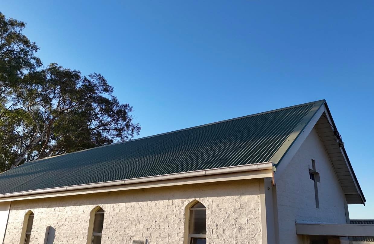 A stunning sunset graces this new roof on an old church in Barfold, which we recently completed for @sandemanbuild The roof is #pale eucalypt @colorbondsteel