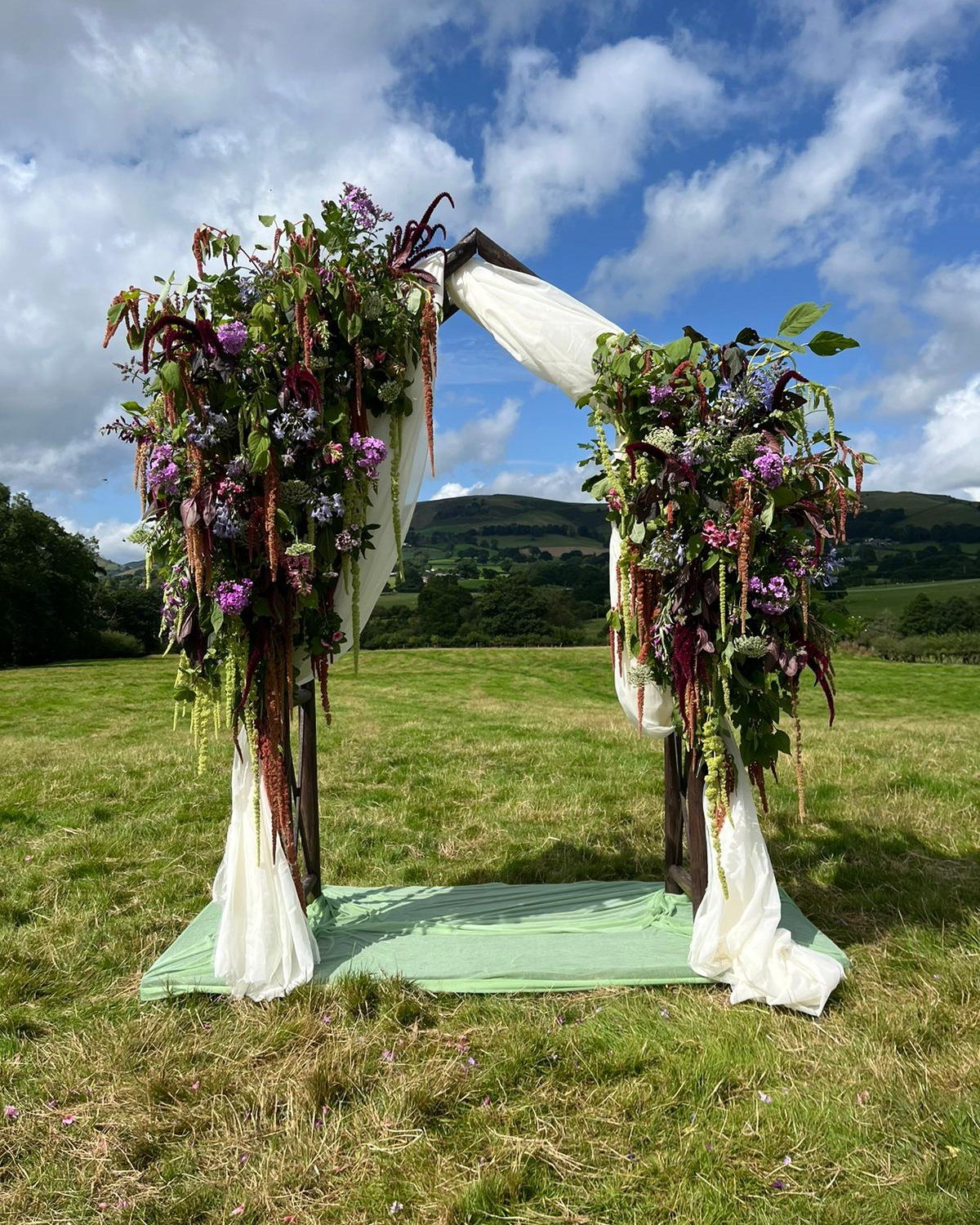Whether you’re dreaming of a majestic floral arch, boots brimming with summer blooms, a delicate buttonhole, or a glorious flower crown — we’re always here to chat through ideas for your special day.
We love the unusual requests. The more creative, the better.
Our arrangements are seasonal, whimsical, and thoughtfully grown here in North Wales.
If you’d like to start the conversation, head to the website and fill in an enquiry form — we’ll be in touch 🌸
