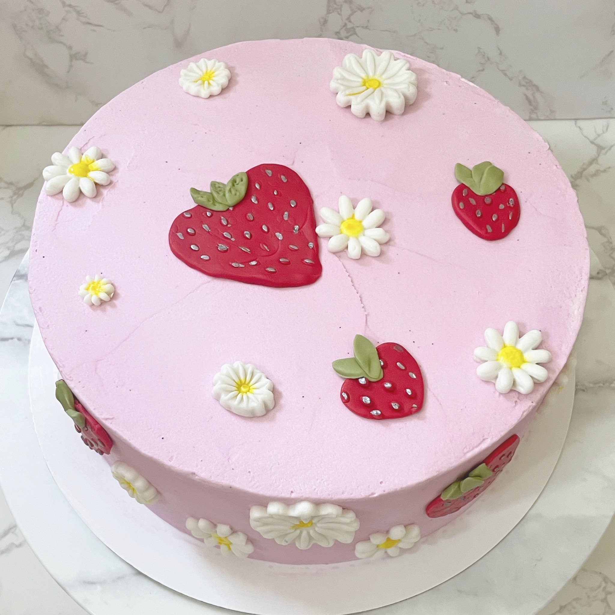 Two cakes, one theme, totally different looks! 🎂
Sometimes even a familiar theme needs a fresh spin—but a little brainstorming, a pop of color, and some fondant magic, and suddenly it’s all sweetness with a strawberry on top 🍓
The pink beauty with strawberries and daisies followed an inspo pic, while the second one was a “work your magic” moment — and I couldn’t be happier with how both orders turned out! 🌼
Why stress when you can "dessert" your worries? 🙃 Share your theme and leave all the thinking and creating to me. Sit back, relax (i.e. tackle everything else on your to-do list) while I bring your sweet vision to life! ✨
Size/Flavor: 8" Chocolate
Buttercream: Vanilla
Size/Flavor: 8" Strawberry Heart
Buttercream: Vanilla
🌐 www.treatsbyallyson.com
FB: Treats by Allyson
IG: @treatsbyallyson
New here? Welcome! 👋🏻 All my treats are dairy, egg, peanut, and tree nut-free, with fully customizable options: i.e. gluten, sugar & other ingredients to meet your needs—all without compromising on flavor (seriously, though, they’re even better!). Don’t believe me? Try them—you’ll never look back!
#CustomTreats #CakeDecorating #carrollcounty #carrollcountymd #carrollcountymaryland #weddingcakes #localbaker #localbakery #localbakeries #cupcakes #carrollcountybakery #manchestermd #hanoverpa #westminstermd #customcake #customcakes #customcakes #birthdaycake #WinterDesserts #HolidayBaking #holidaybakingseason #holidaytreats #valentinesday #valentinesdaytreats #valentinesdaydessert #valentinesdaydesserts