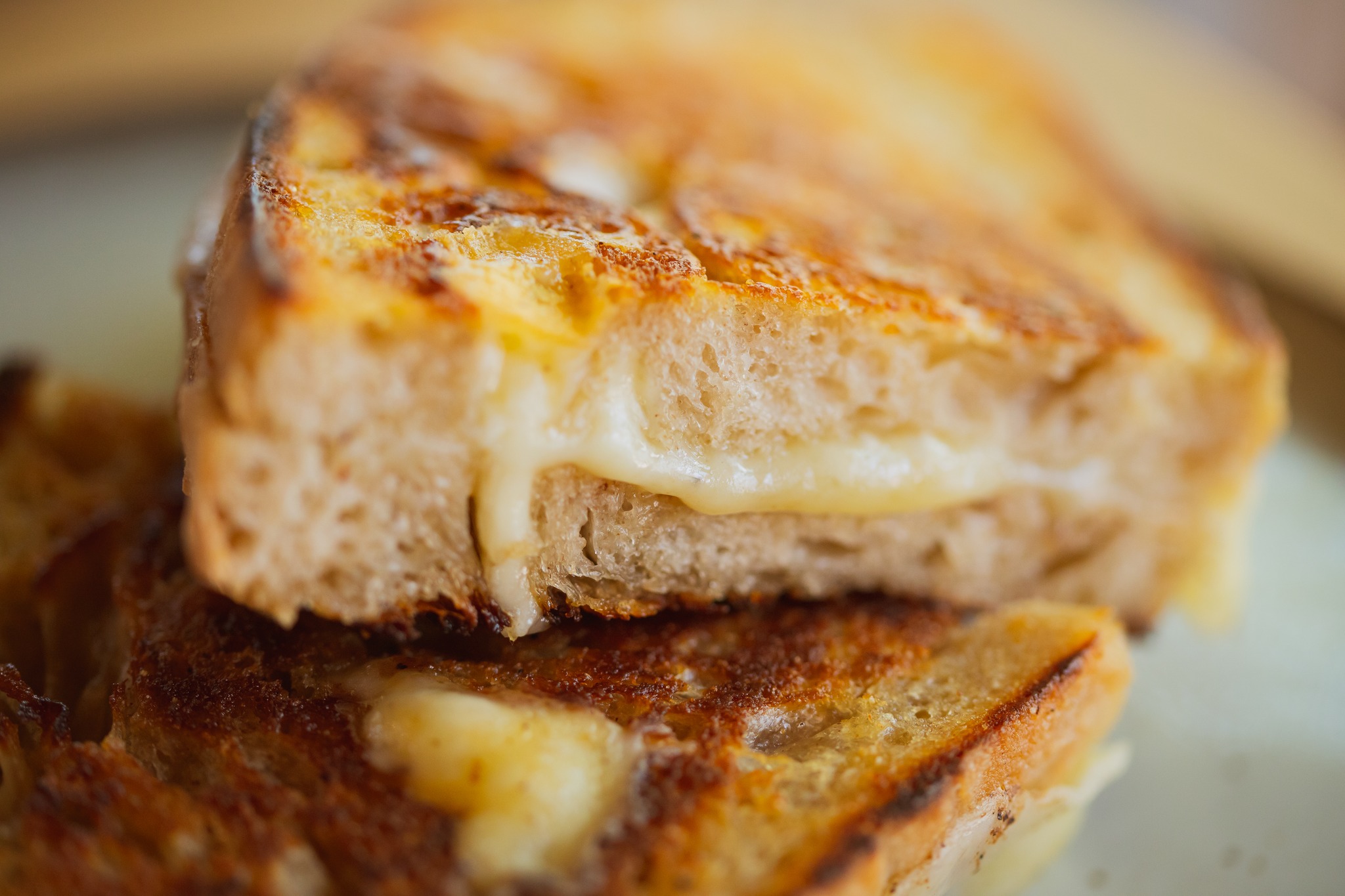 Truffle Grilled Cheese!
Storia Cucina sourdough, Ferndale Farmstead Fontina, and Italian black truffle sauce. If you really want the full experience, we highly recommend dipping it into a cup of tomato soup.
